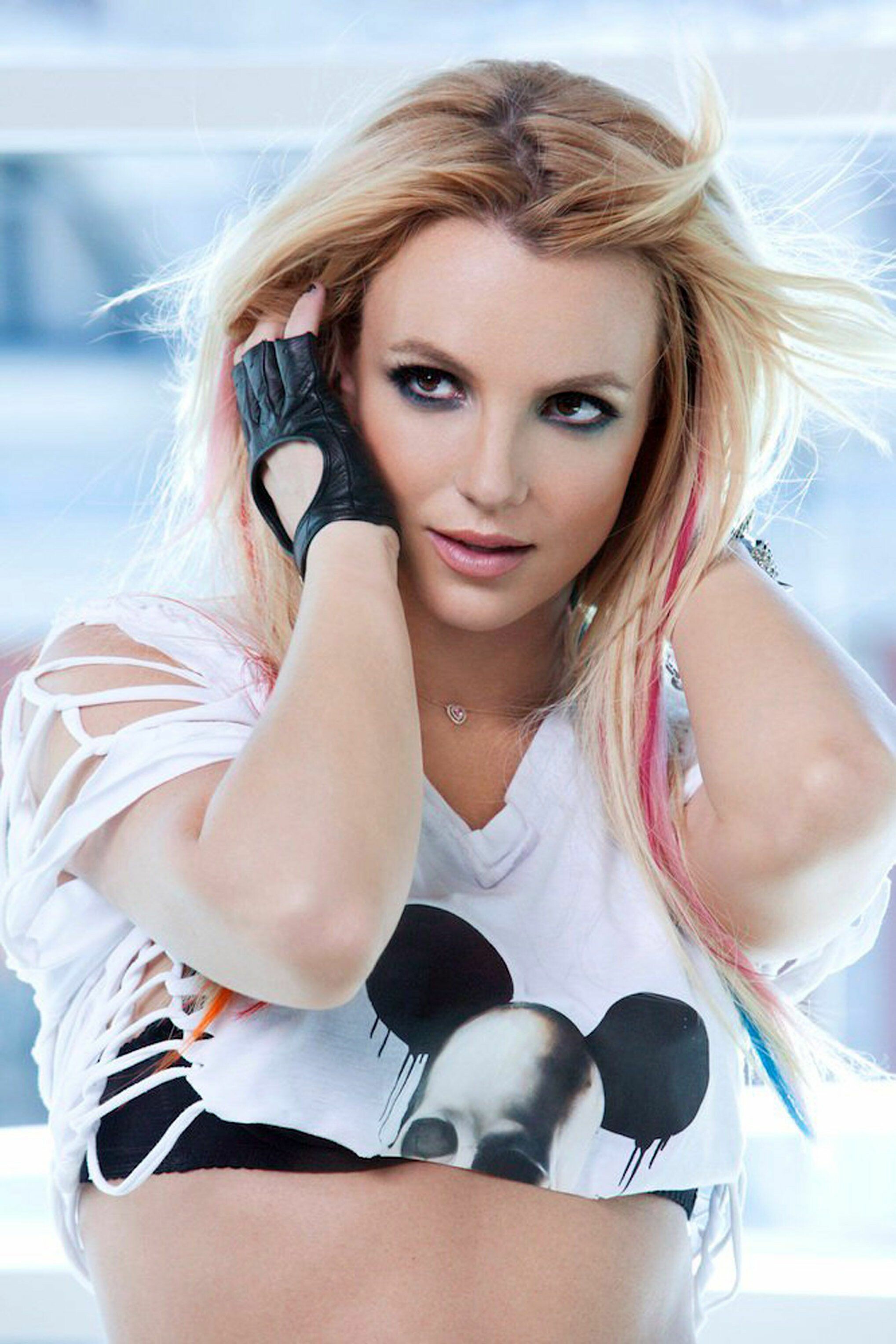 Britney Spears: Albums Britney (2001) and In the Zone (2003), Known for provocative style. 2040x3060 HD Wallpaper.