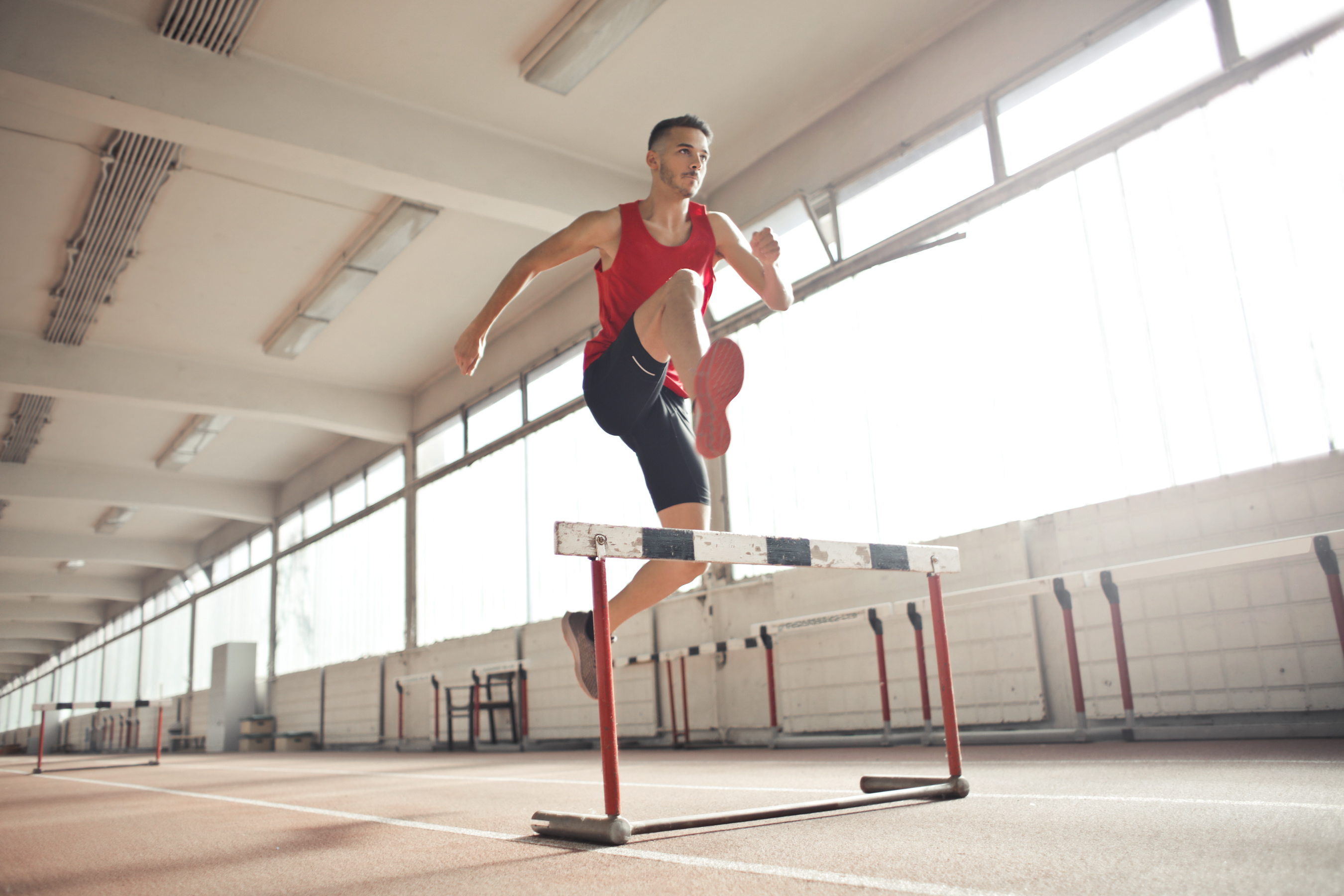 Hurdling: Training session, Track and field hurdles, Steeplechase, Jumping over a hurdle. 2700x1800 HD Background.
