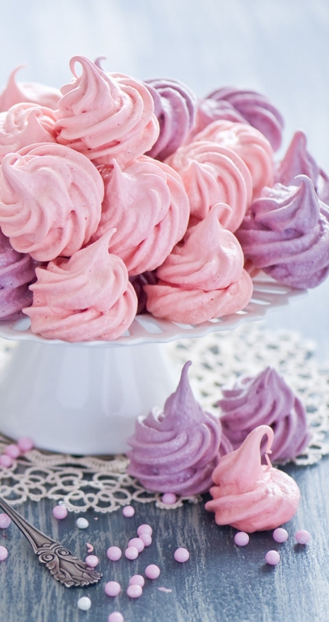 Meringue: Made by beating egg whites to firm peaks, then slowly whisking in hot sugar syrup. 1080x2040 HD Wallpaper.