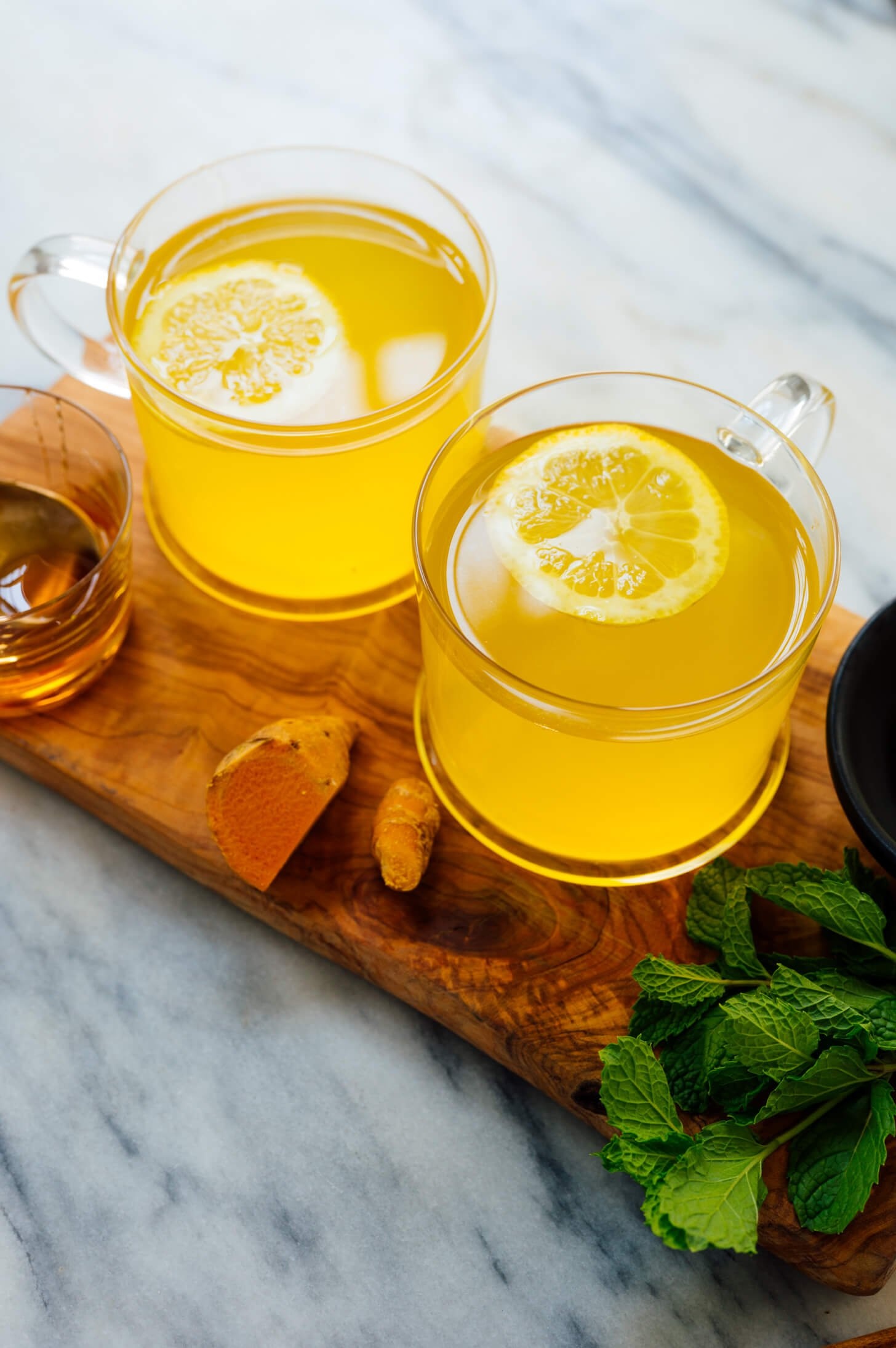 Tea: Turmeric drink, A warm and soothing blend of ground turmeric, lemon juice, and honey. 1460x2190 HD Wallpaper.