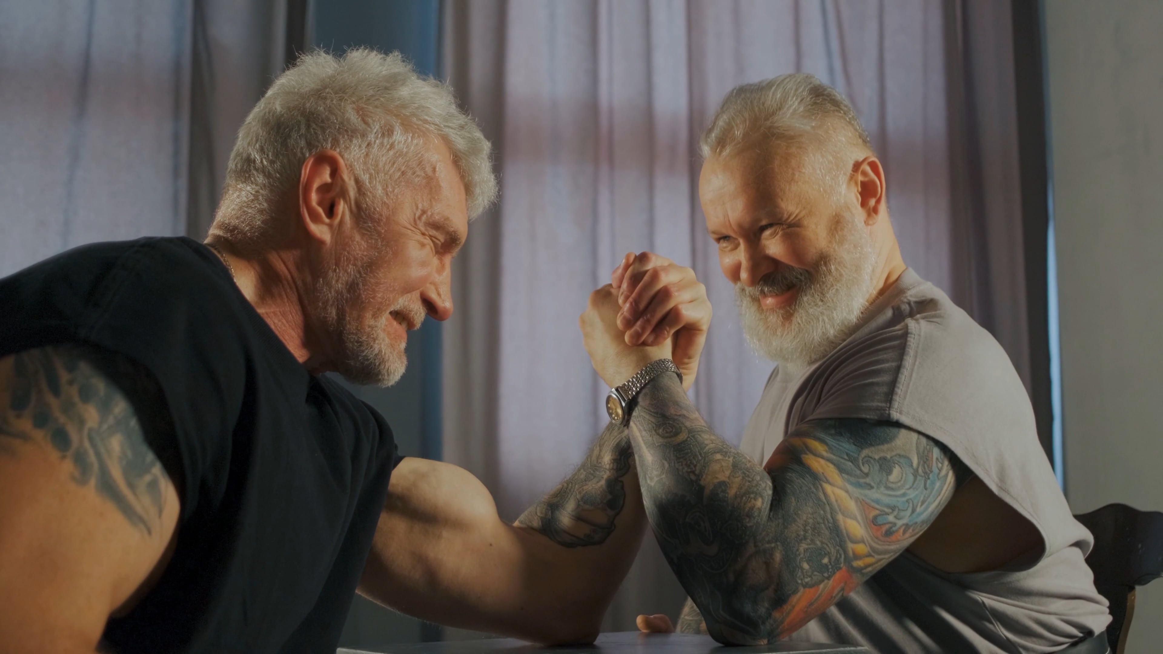Arm Wrestling: Sport with bent elbows placed on a table, Two tattooed men wrestle on their hands, Strong arms. 3840x2160 4K Wallpaper.