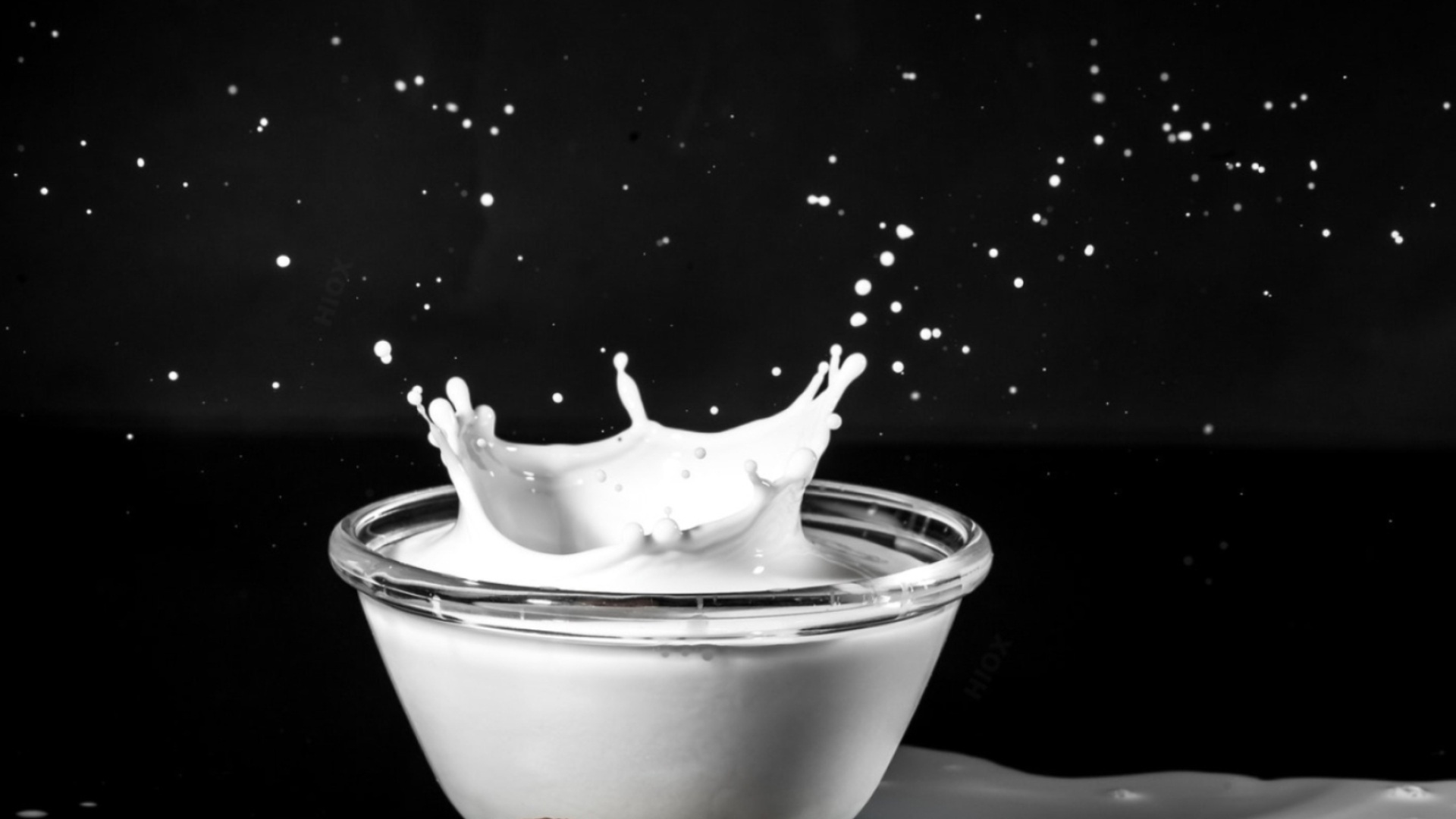 Milk: A primary ingredient in traditional desserts like rice pudding or custard. 1920x1080 Full HD Background.