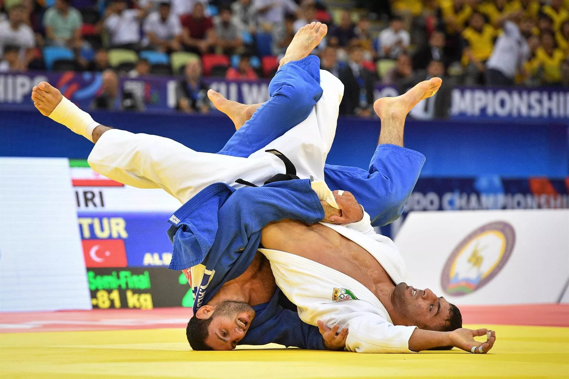 Judo: Vedat Albayrak vs. Damian Szwarnowiecki, The 2018 World Judo Championships in Azerbaijan. 1920x1280 HD Background.