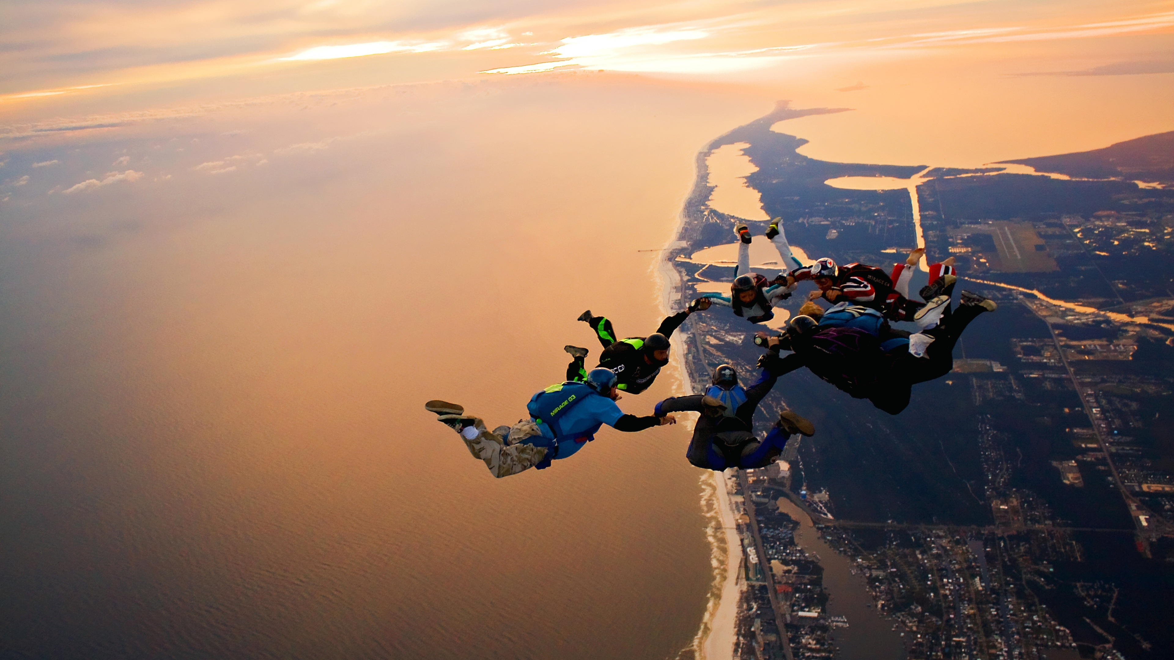 Parachuting: Group extreme air formation, Jumping with parachutes, Aerobatics. 3840x2160 4K Wallpaper.