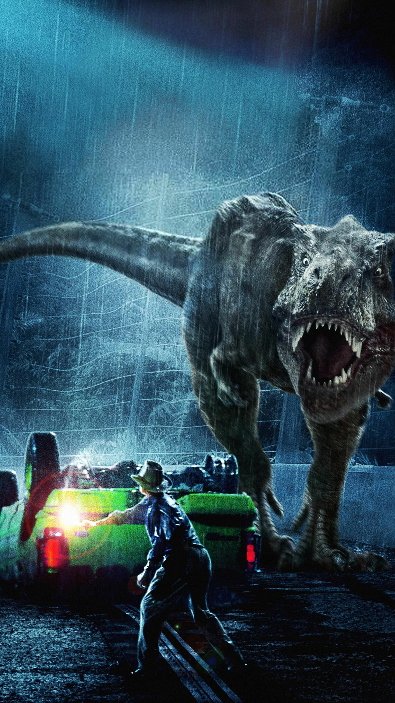 Jurassic Park: Directed by Steven Spielberg and produced by Kathleen Kennedy and Gerald R. Molen. 1540x2740 HD Background.
