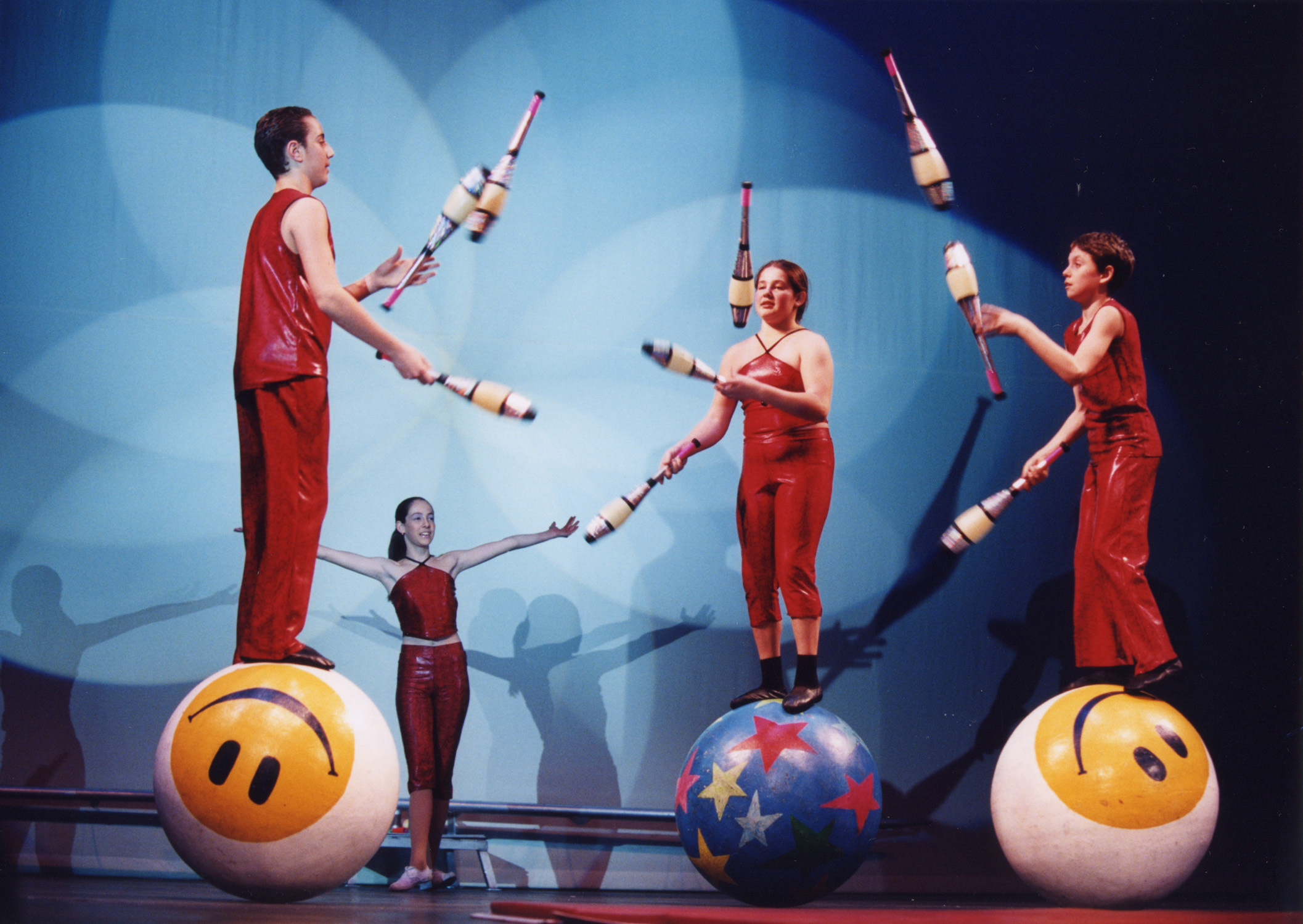 Juggling: Professional jugglers perform while standing on big balls during an event at the circus. 2120x1500 HD Wallpaper.