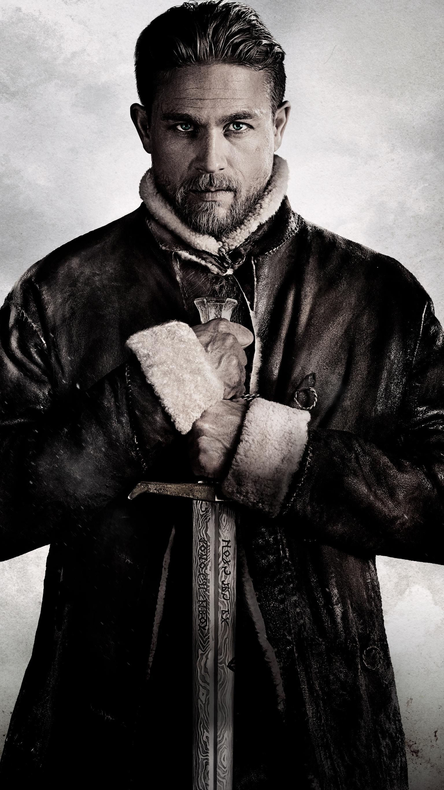Charlie Hunnam: The role of King Arthur, A legendary king of Britain, and a central figure in the medieval literary tradition. 1540x2740 HD Background.