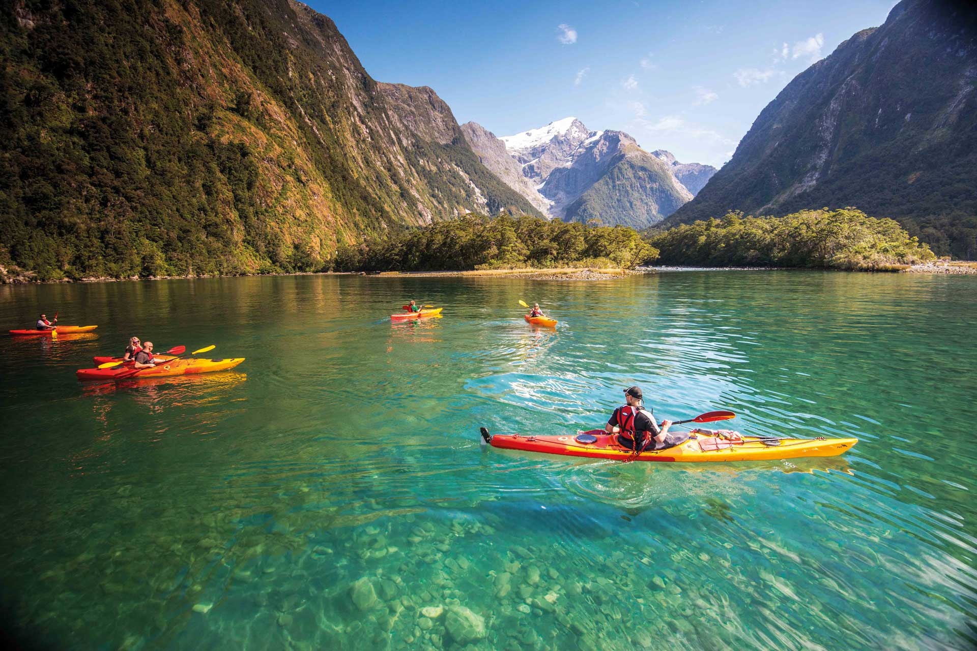 Kayaking: Recreational boating in Milford Sound fiord in the southwest of New Zealand's South Island. 1920x1290 HD Wallpaper.