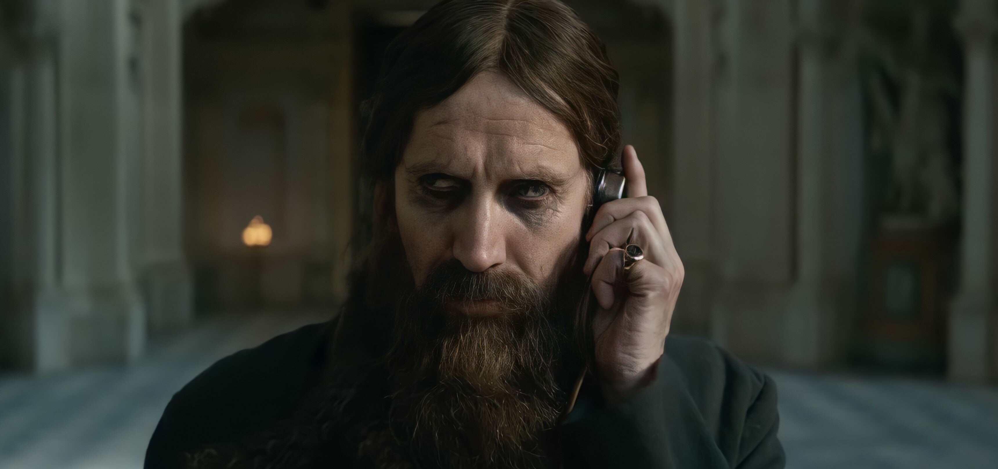 The King's Man: Rhys Ifans as Grigori Rasputin, the Tsar's personal physician. 3440x1620 Dual Screen Wallpaper.