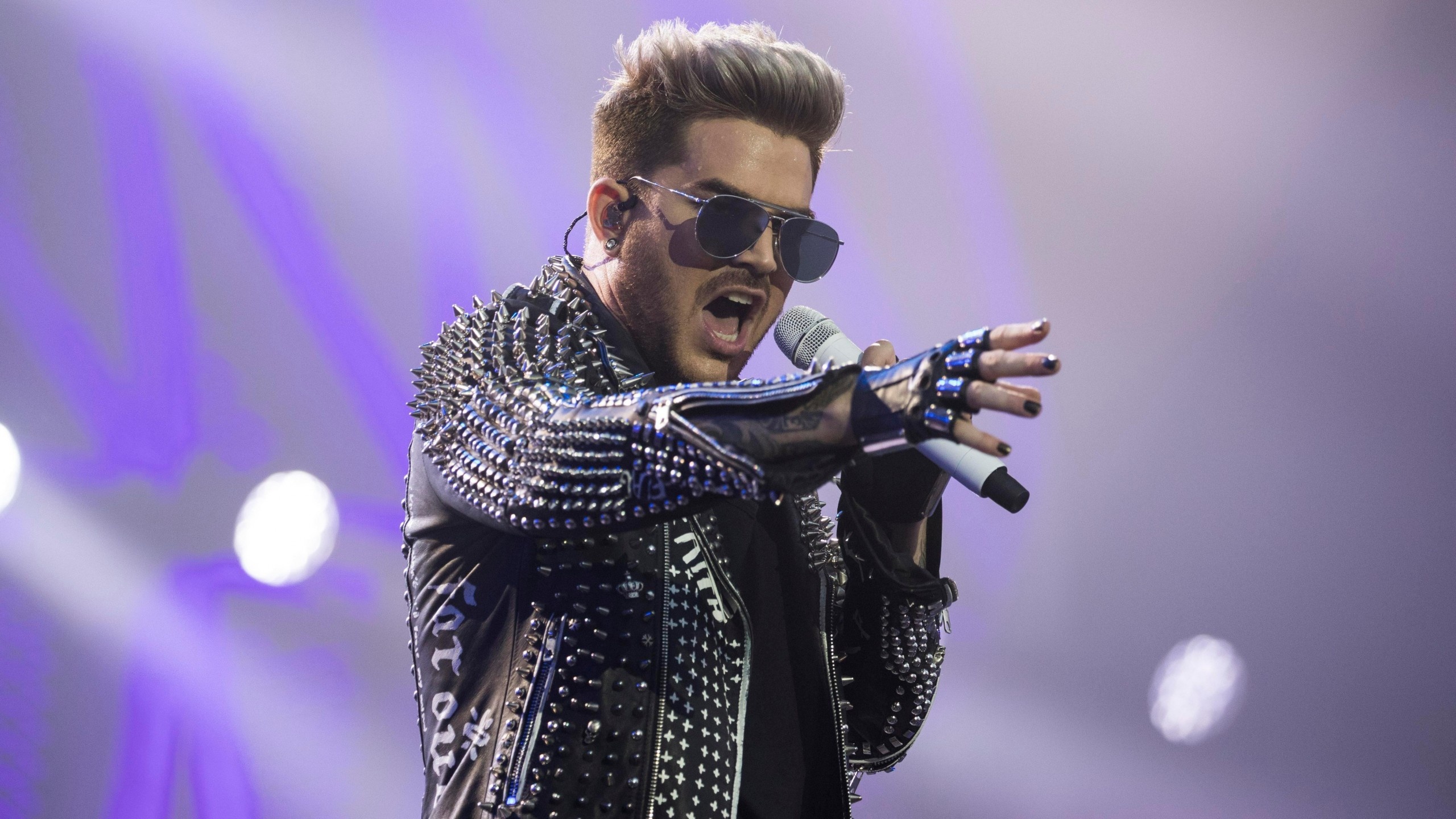 Adam Lambert: Released his second studio album Trespassing in 2012. 2560x1440 HD Background.