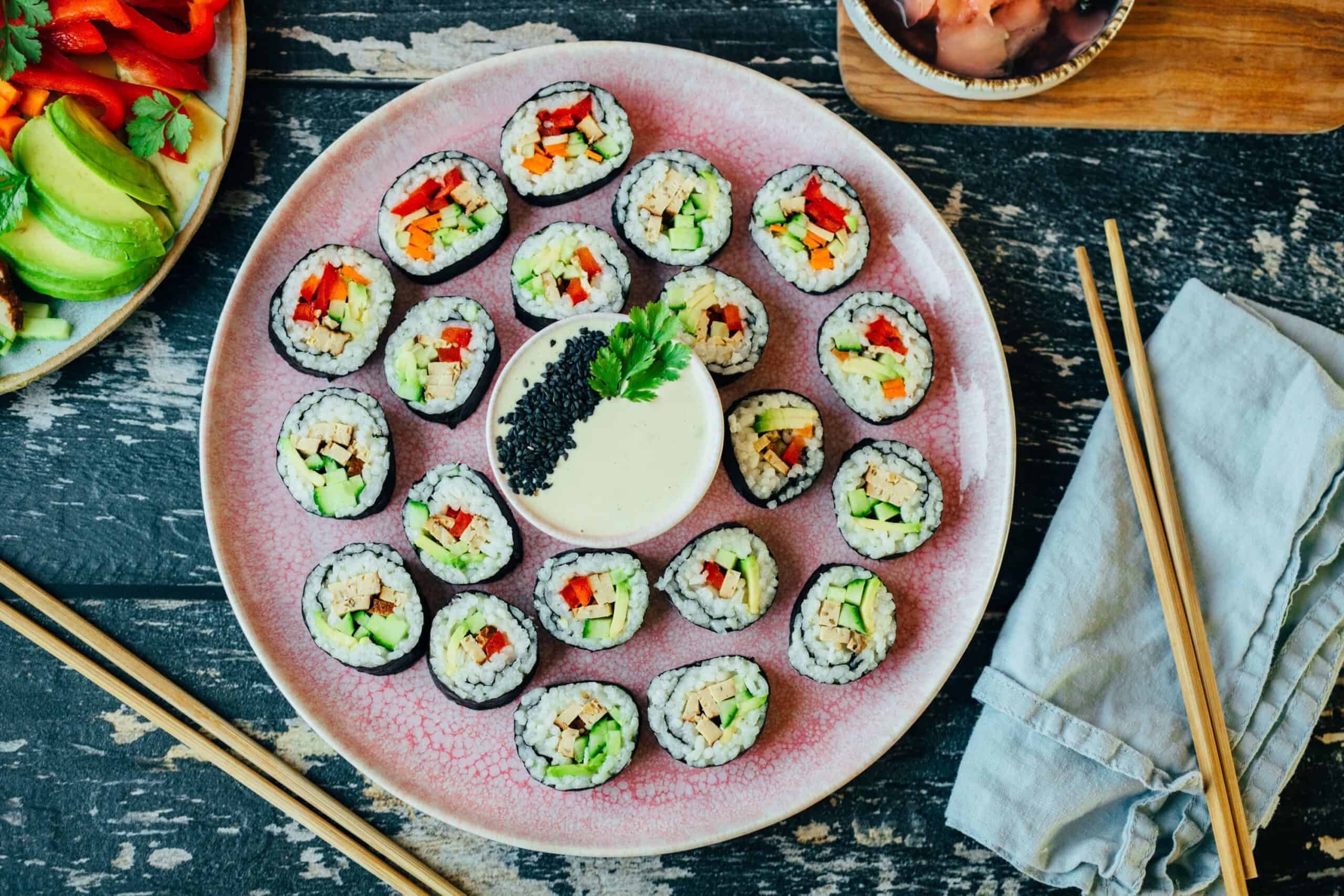 Sushi: Prepared with seaweed-encased seasoned rice that has been wrapped around various types of filling. 2560x1710 HD Wallpaper.