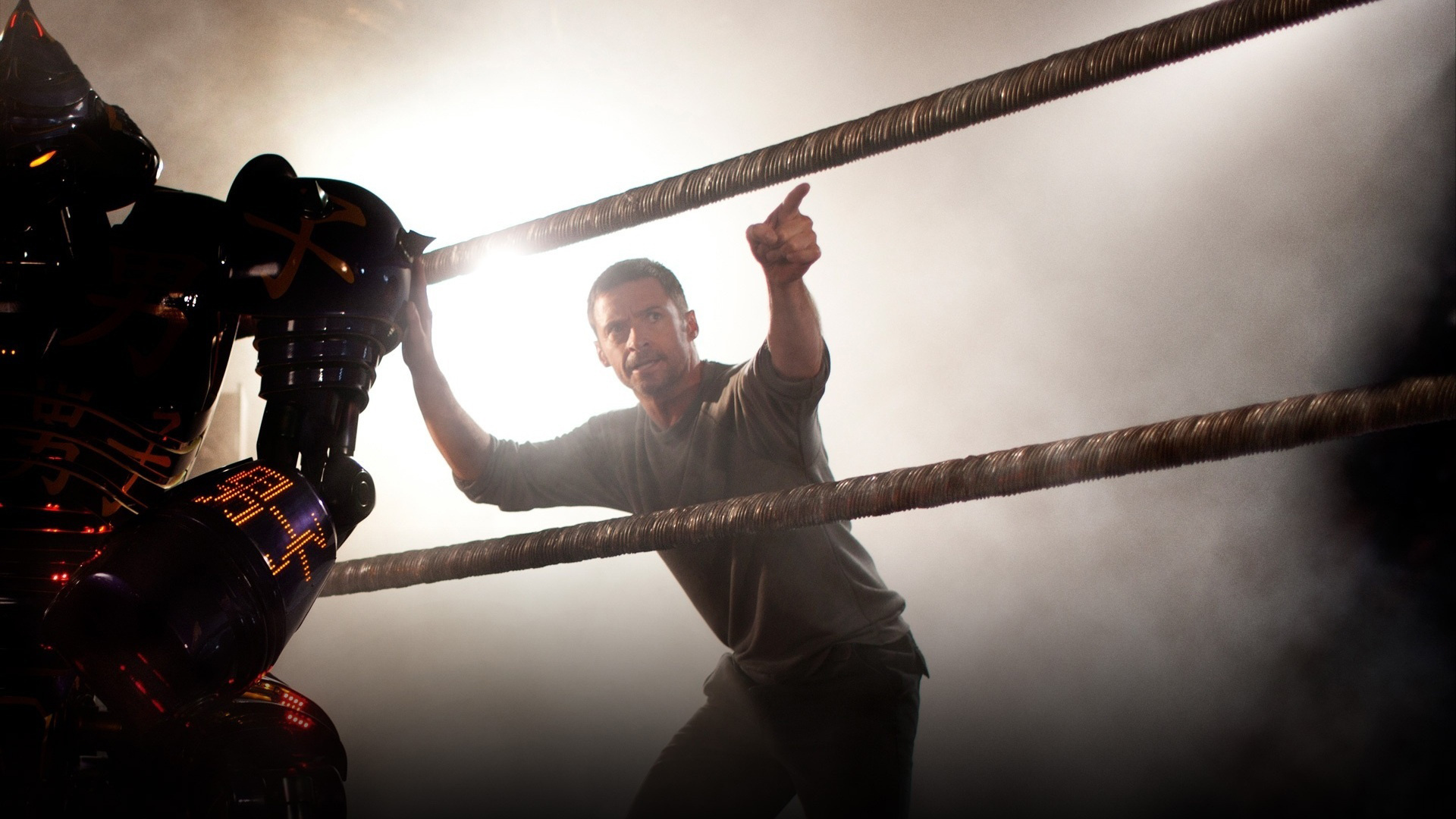 Real Steel: A former boxer (Jackman) whose sport is now played by robots. 1920x1080 Full HD Background.