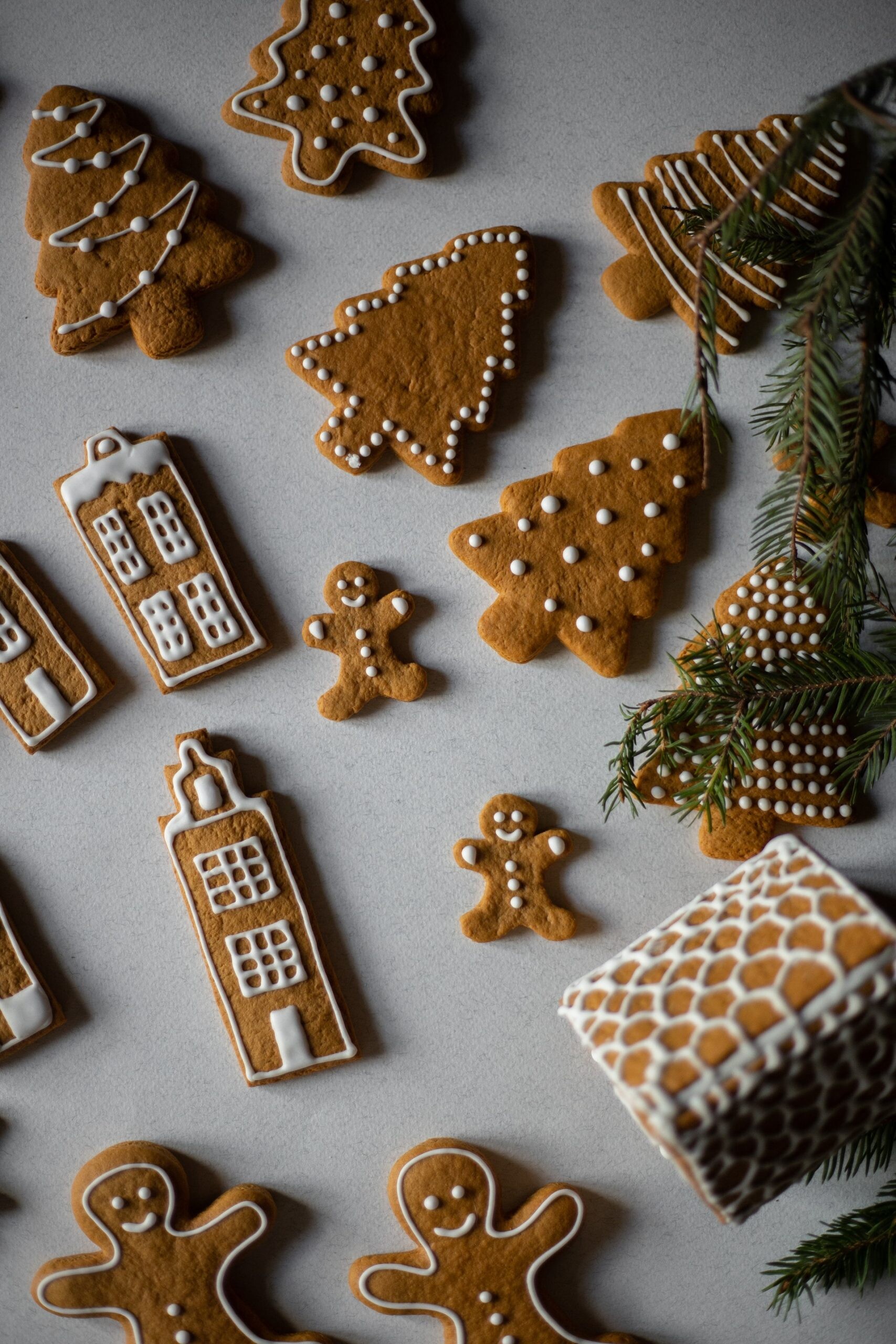 Gingerbread House: Gingerbread men, Melt-in-the-mouth gourmet cookies, Christmas bakery, Festive Christmas decor. 1710x2560 HD Background.