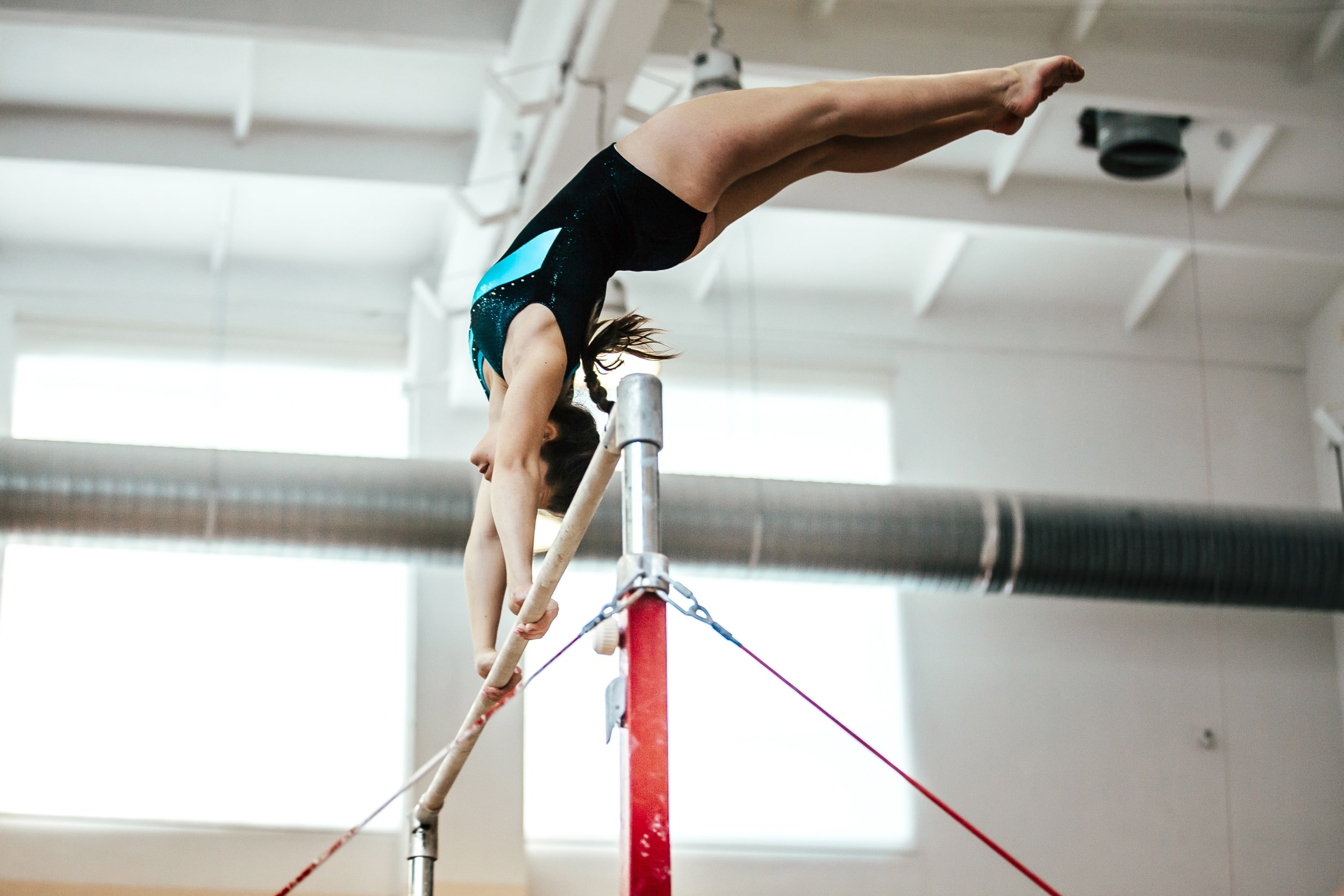 Uneven Bars: Gymnastics gym, UB, The gymnast's transition from bar to bar. 2500x1670 HD Wallpaper.