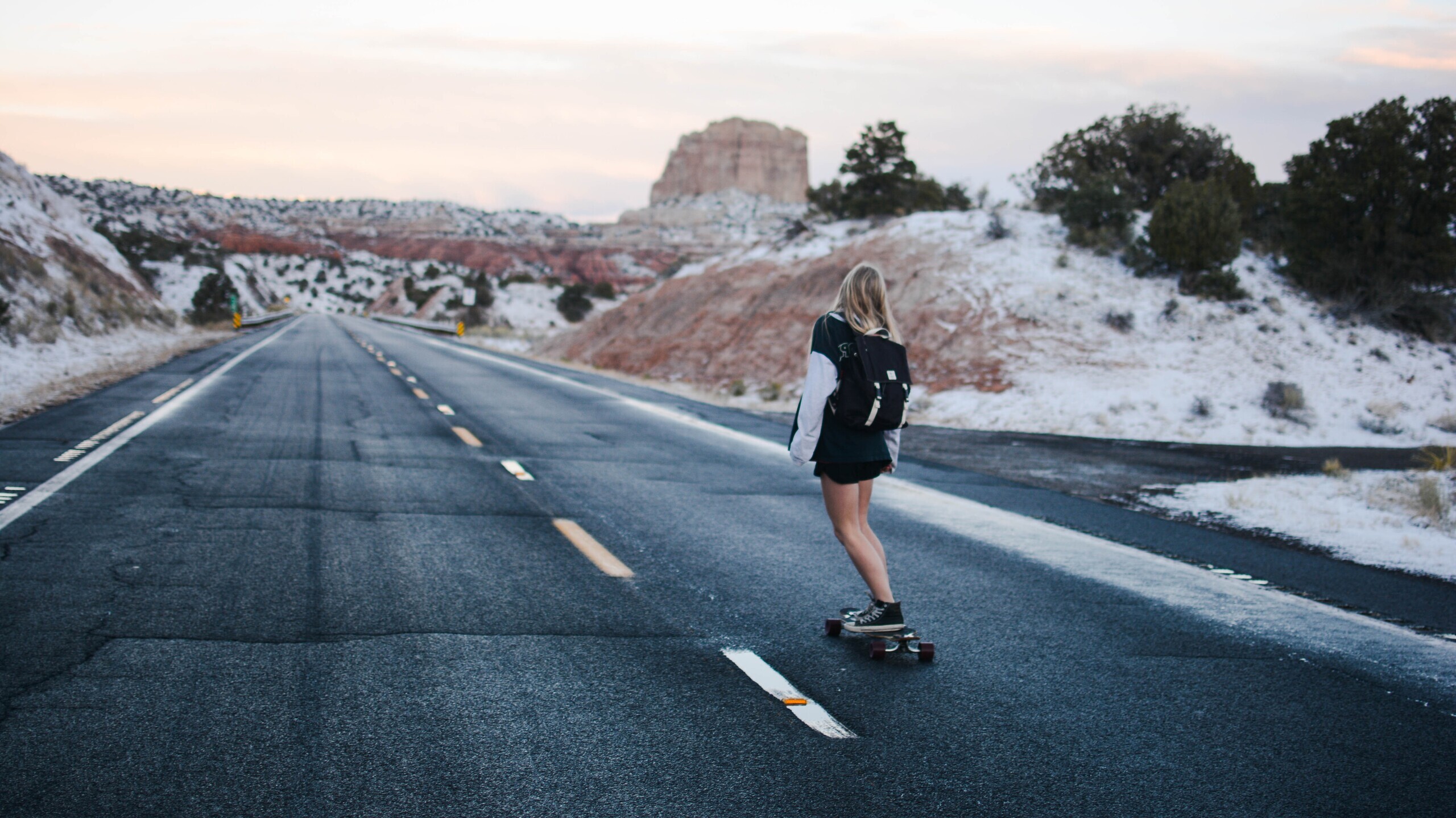 Girl Skateboarding: Using a skateboard as a means of transportation, Commuting on skateboards, cruiser boards, and longboards. 2560x1440 HD Background.