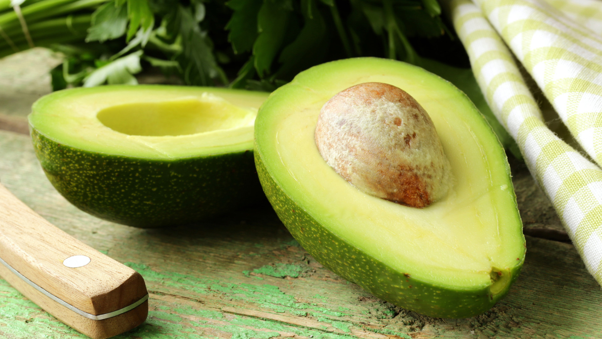 Avocado: Green, pear-shaped, nutrient-dense fruit. 1920x1080 Full HD Wallpaper.