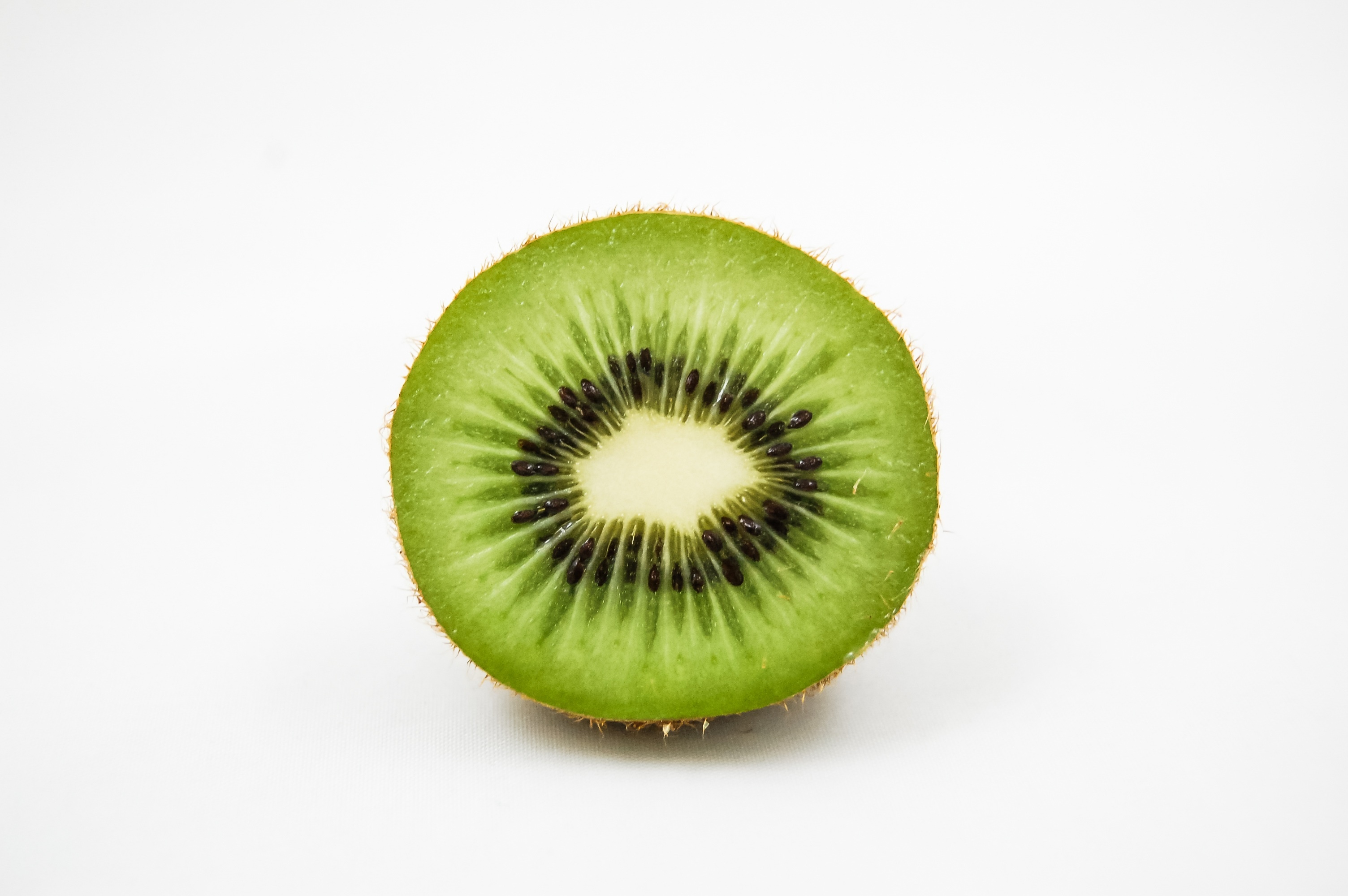Green kiwi fruit, Stock photo, Nature's wonders, Healthy fruit, 3010x2000 HD Desktop