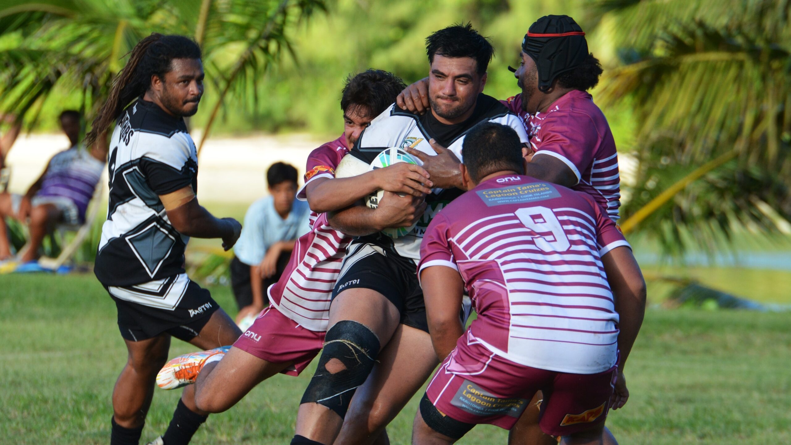 Rugby League: An amateur ball game event during a family tournament in the Cook Islands. 2560x1440 HD Background.