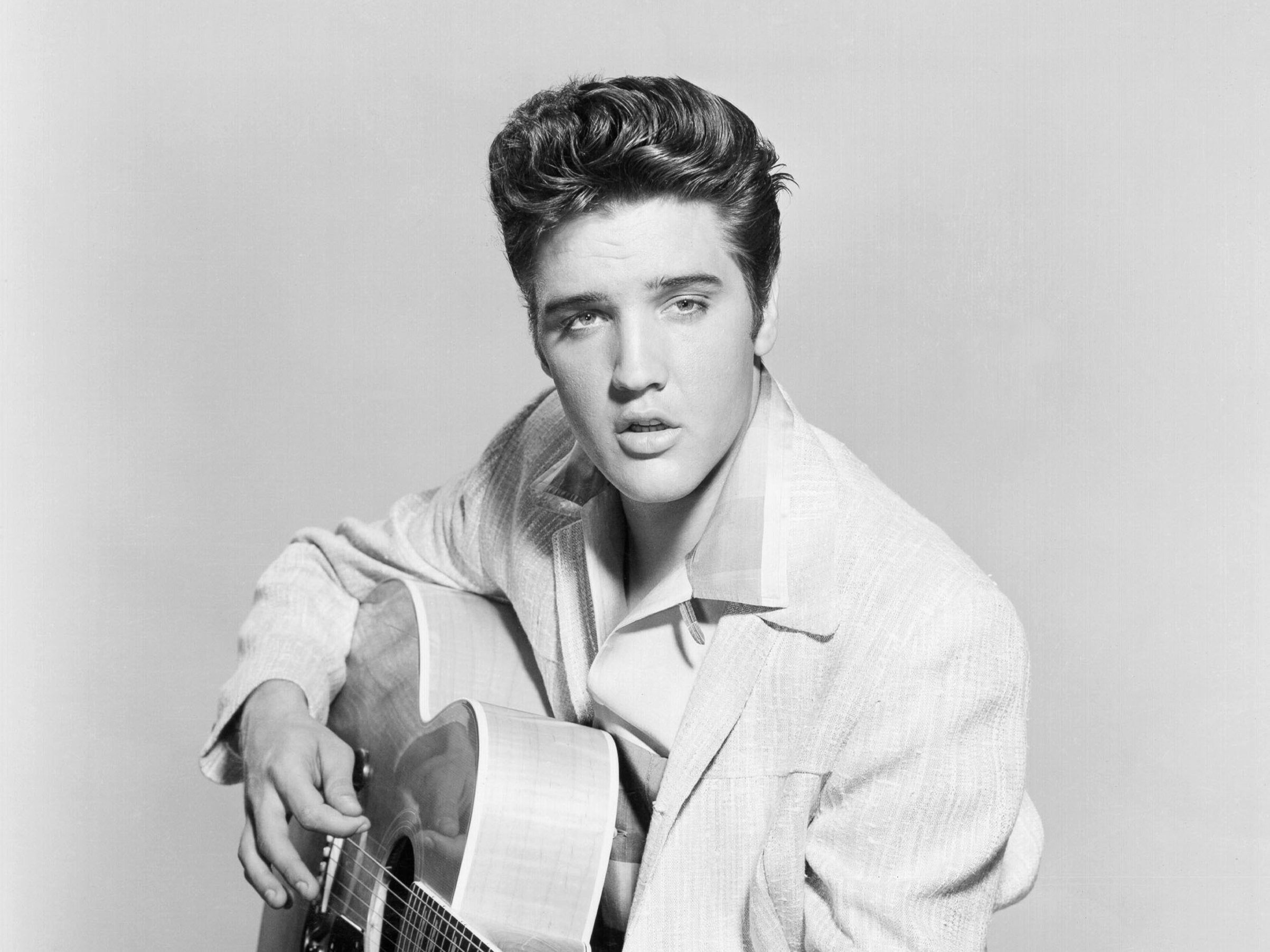 Elvis Presley: Music artist, Famous for charismatic stage presence. 2410x1810 HD Wallpaper.