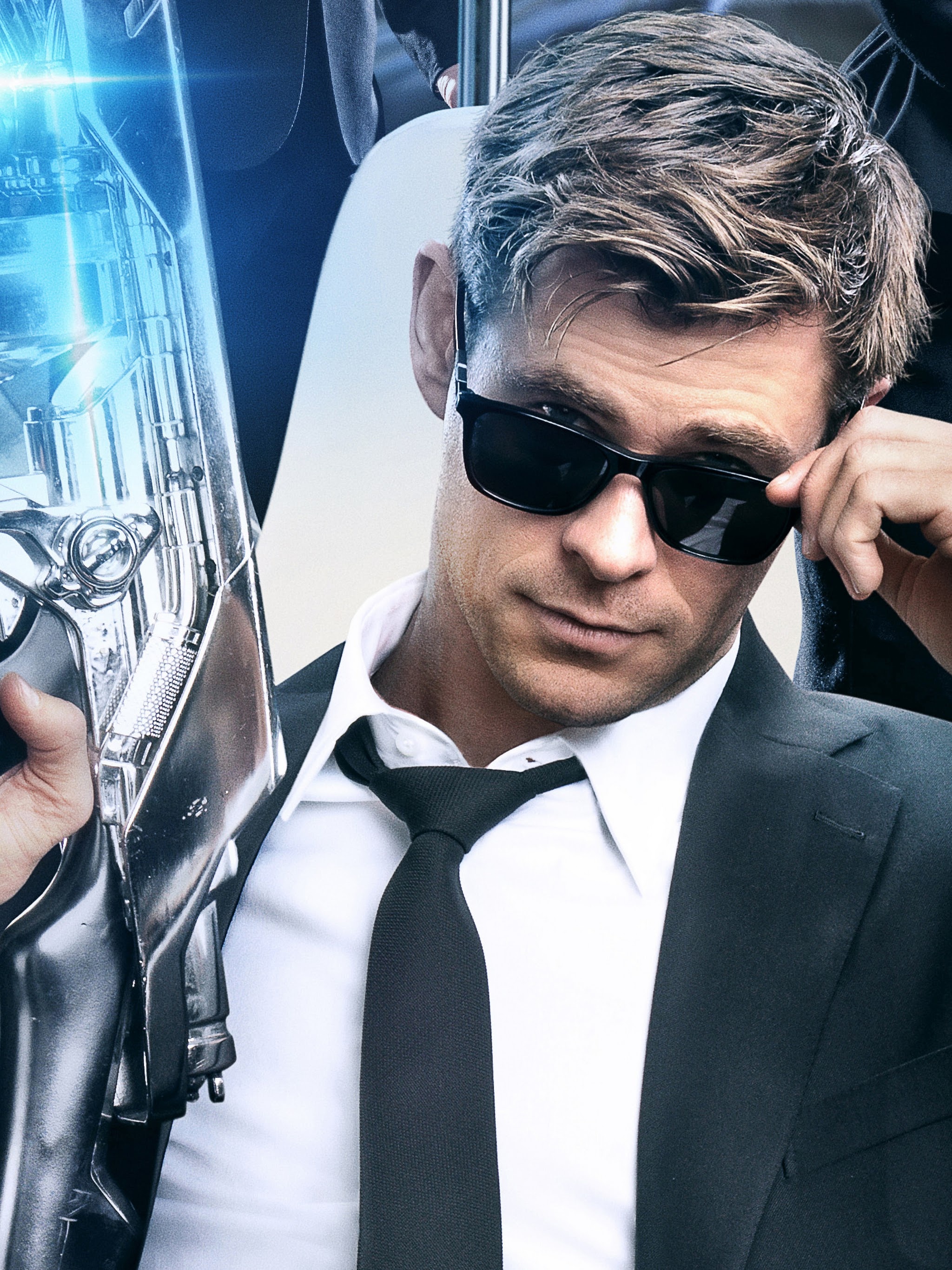 Chris Hemsworth: Known for starring Men in Black: International, Henry, Agent H. 2050x2740 HD Wallpaper.