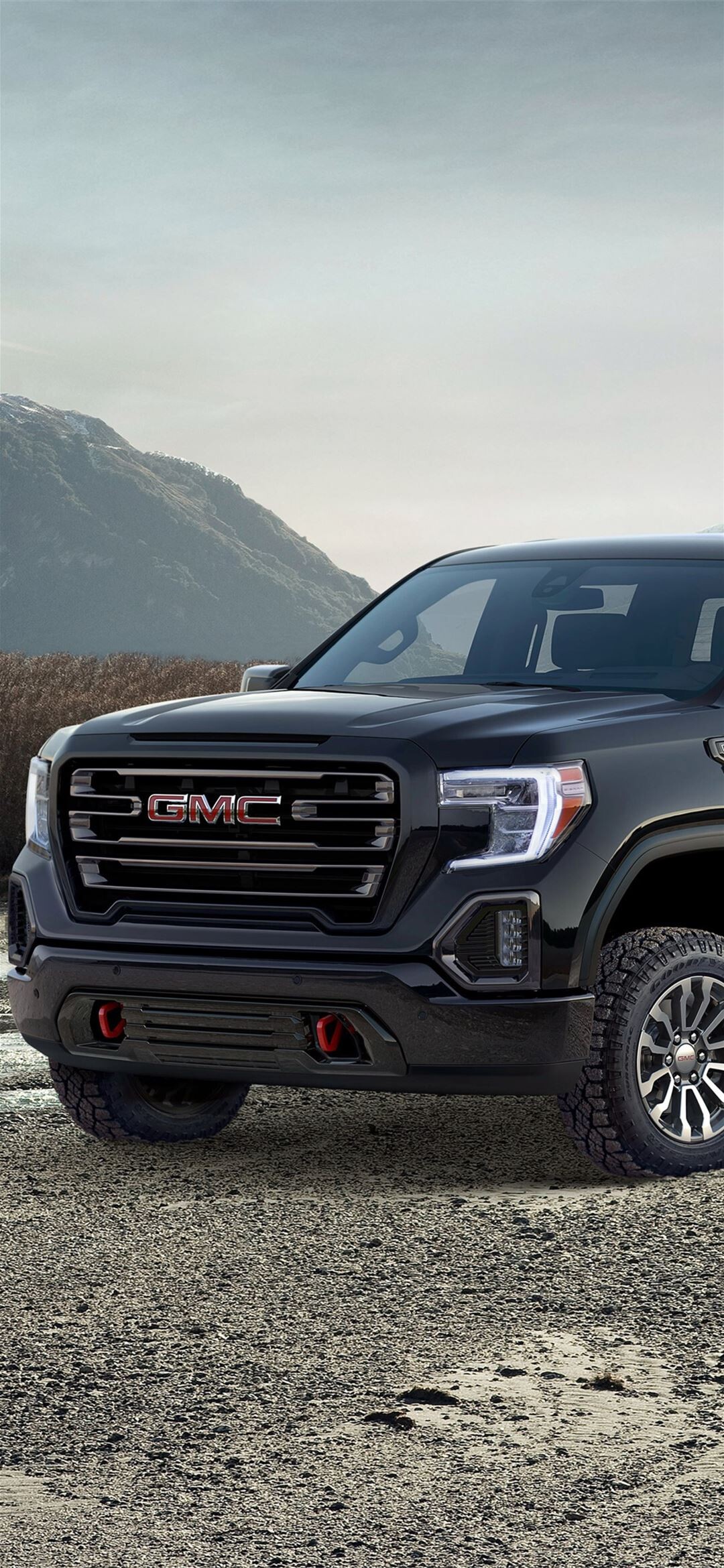 GMC: The most off-road capable factory Sierra AT4, Four-wheel-drive trucks. 1080x2340 HD Background.