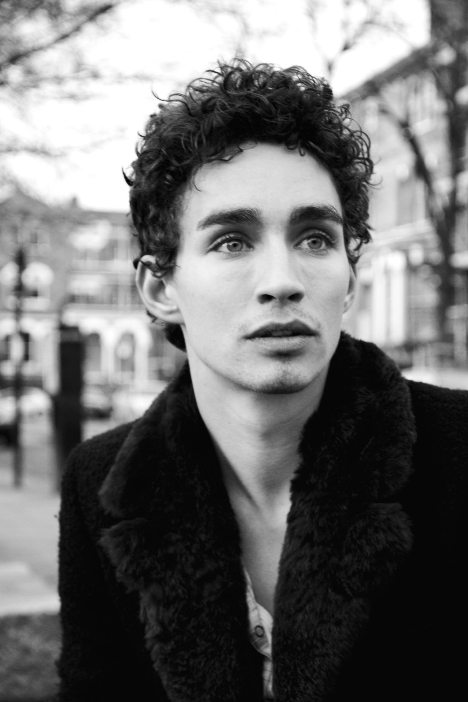 Robert Sheehan wallpapers, Stylish backgrounds, Charming actor, Captivating charm, 1600x2400 HD Phone