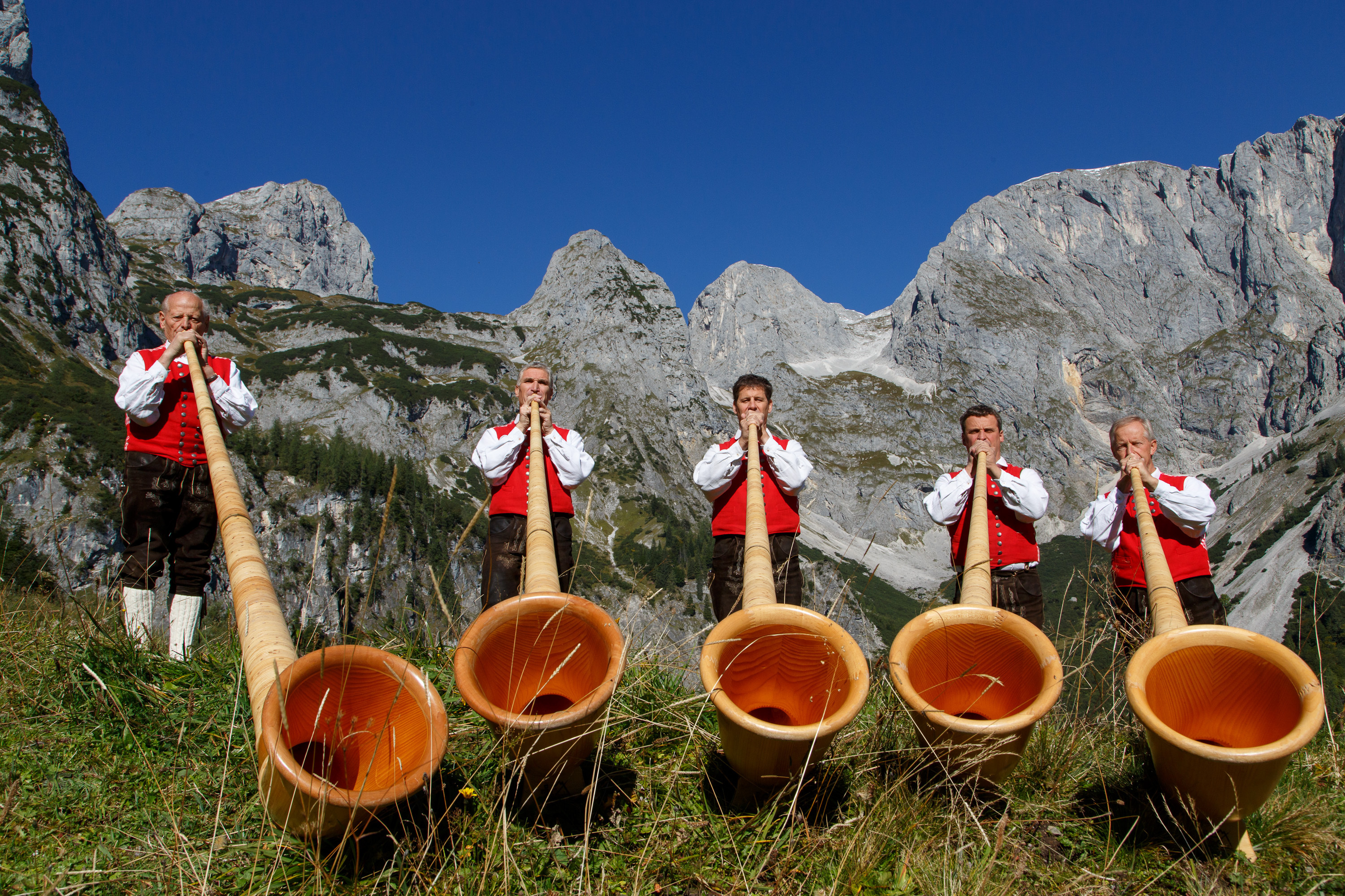 Alphorn: Alphorn players from Annaberg, Three and four meters long, made of wood, Emitting a very special sound. 3000x2000 HD Background.