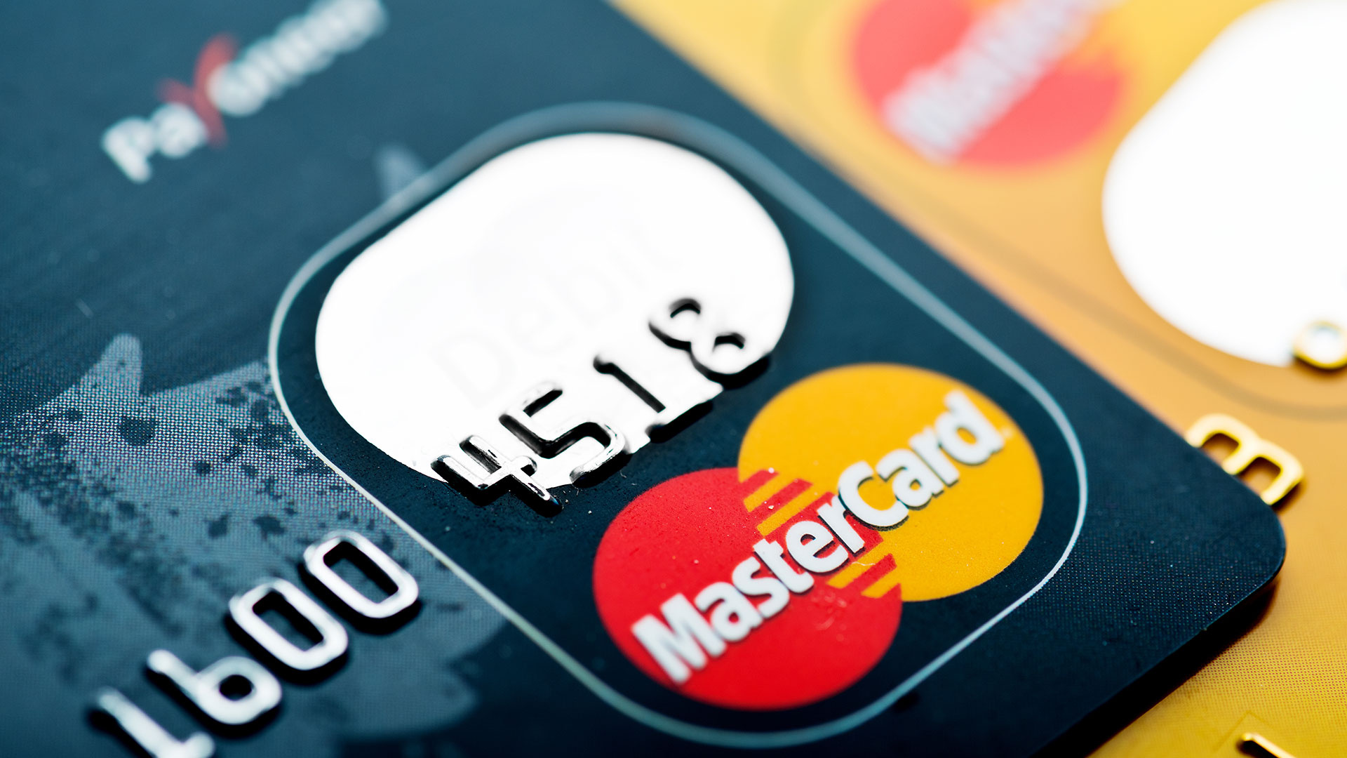 Mastercard: A payment card, Enabling a customer to access their financial accounts. 1920x1080 Full HD Wallpaper.