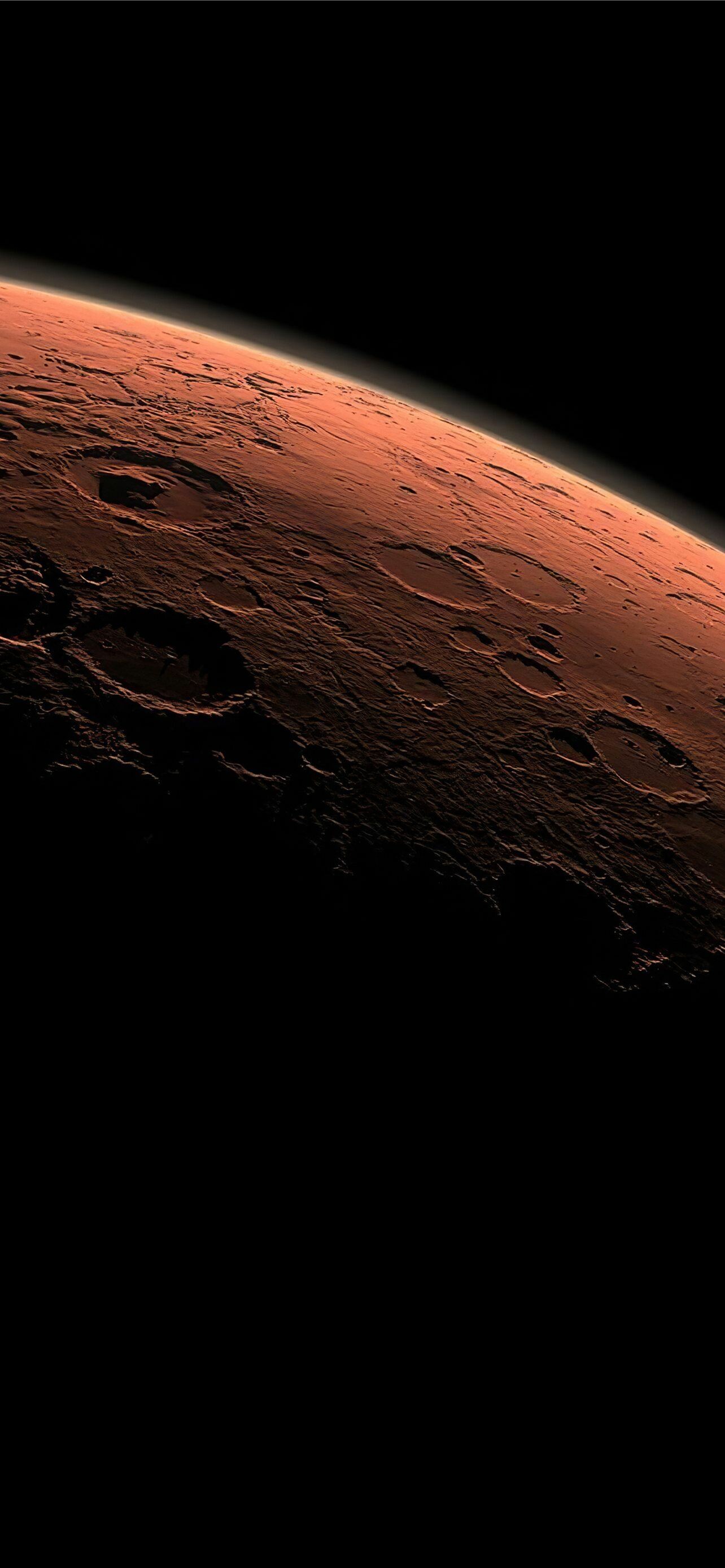 Planet: Mars, a distinct rusty red appearance and two unusual moons. 1290x2780 HD Wallpaper.
