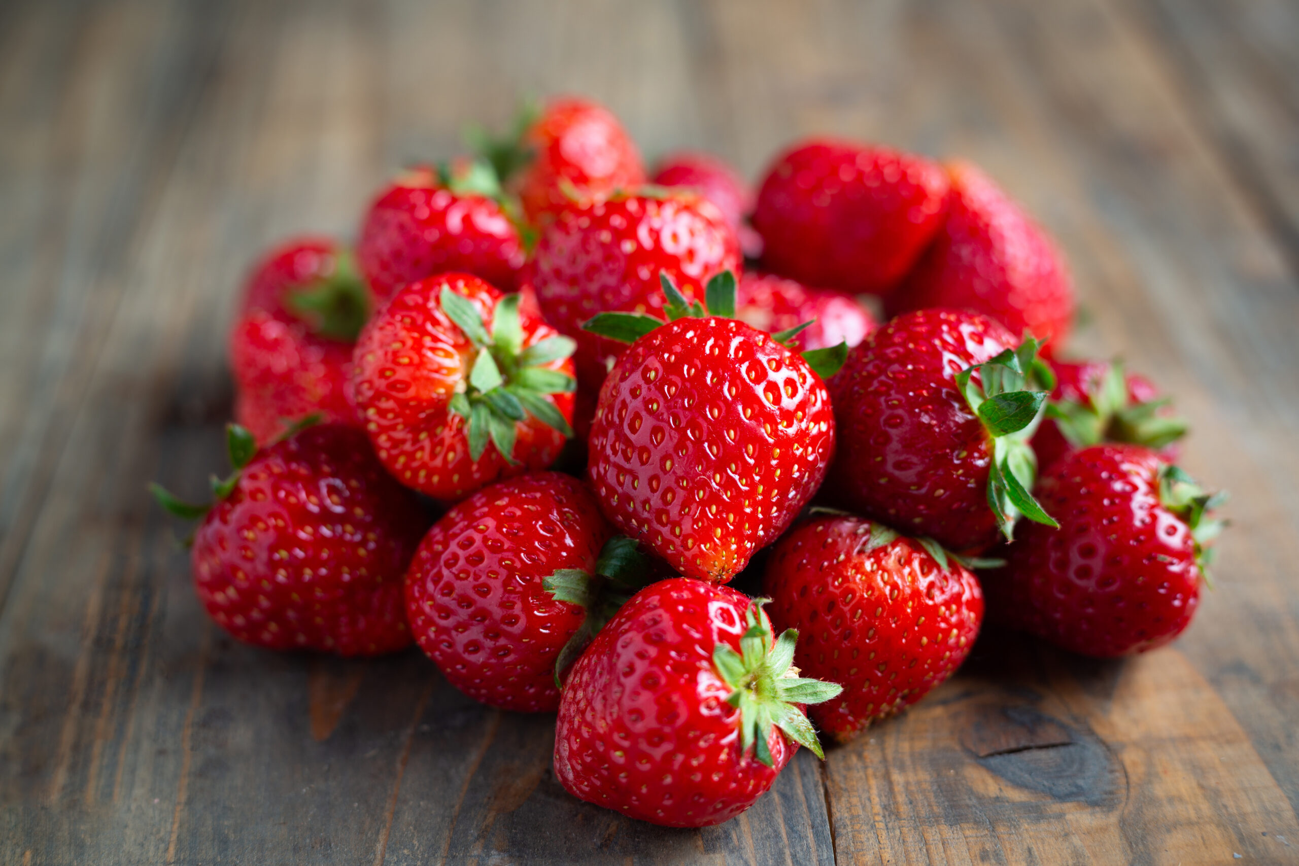 Strawberry: Produced commercially both for immediate consumption and for processing as frozen. 2560x1710 HD Background.