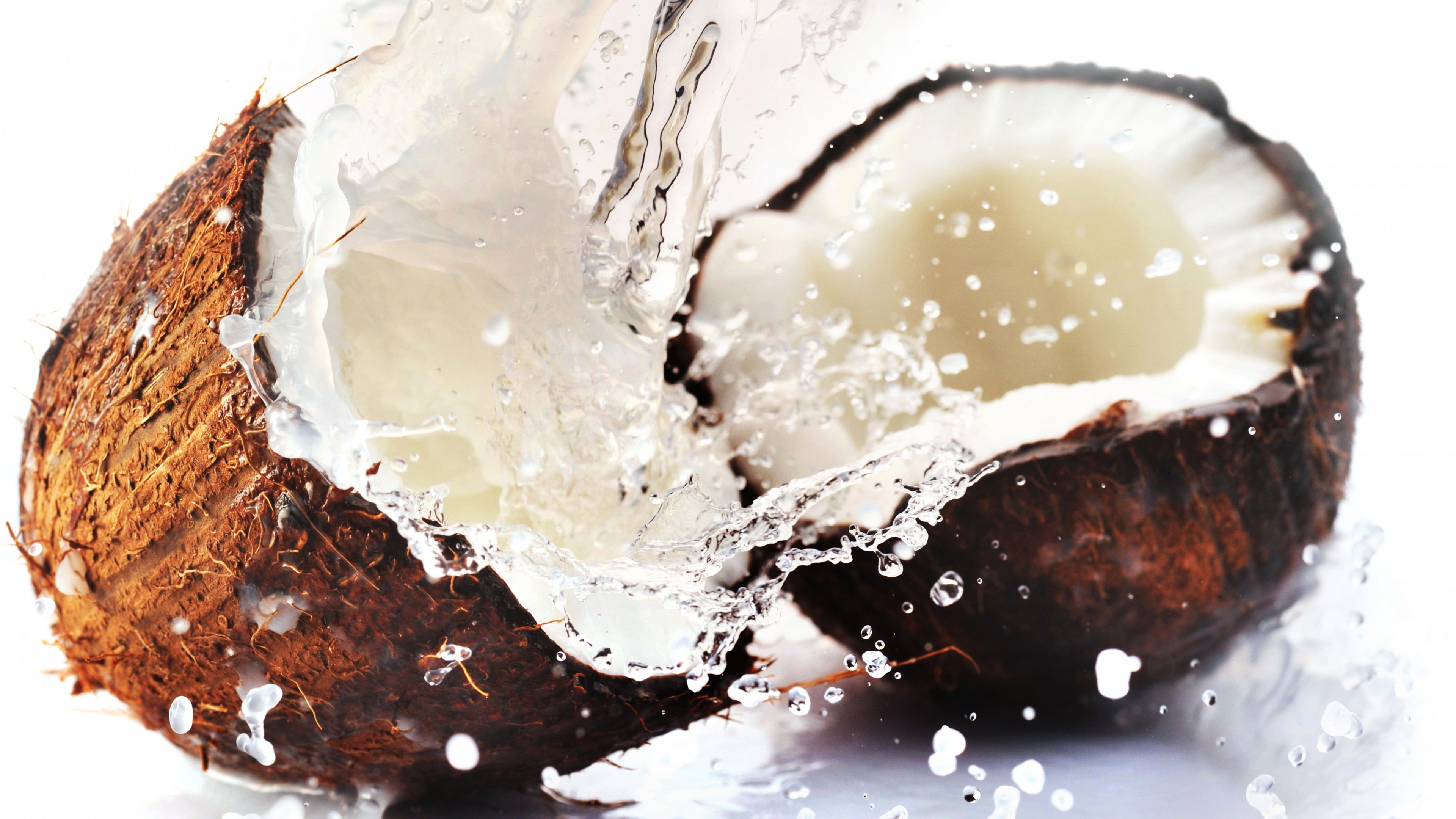 Coconut: A fibrous one-seeded drupe, also known as a dry drupe. 3840x2160 4K Wallpaper.