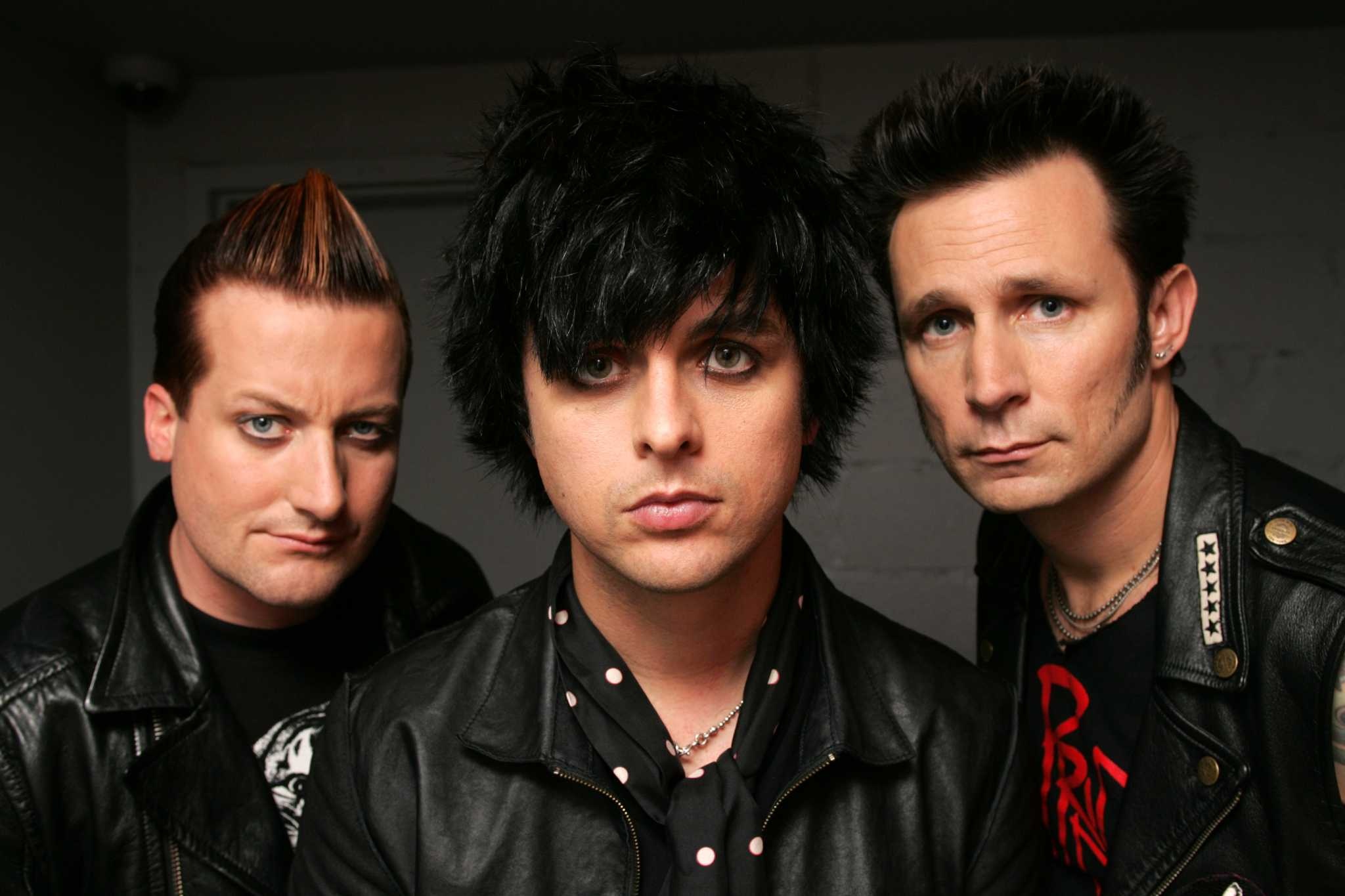 Green Day (Band): Billie Joe Armstrong, Mike Dirnt, Tre Cool - the power trio and the leading members of the group. 2050x1370 HD Background.