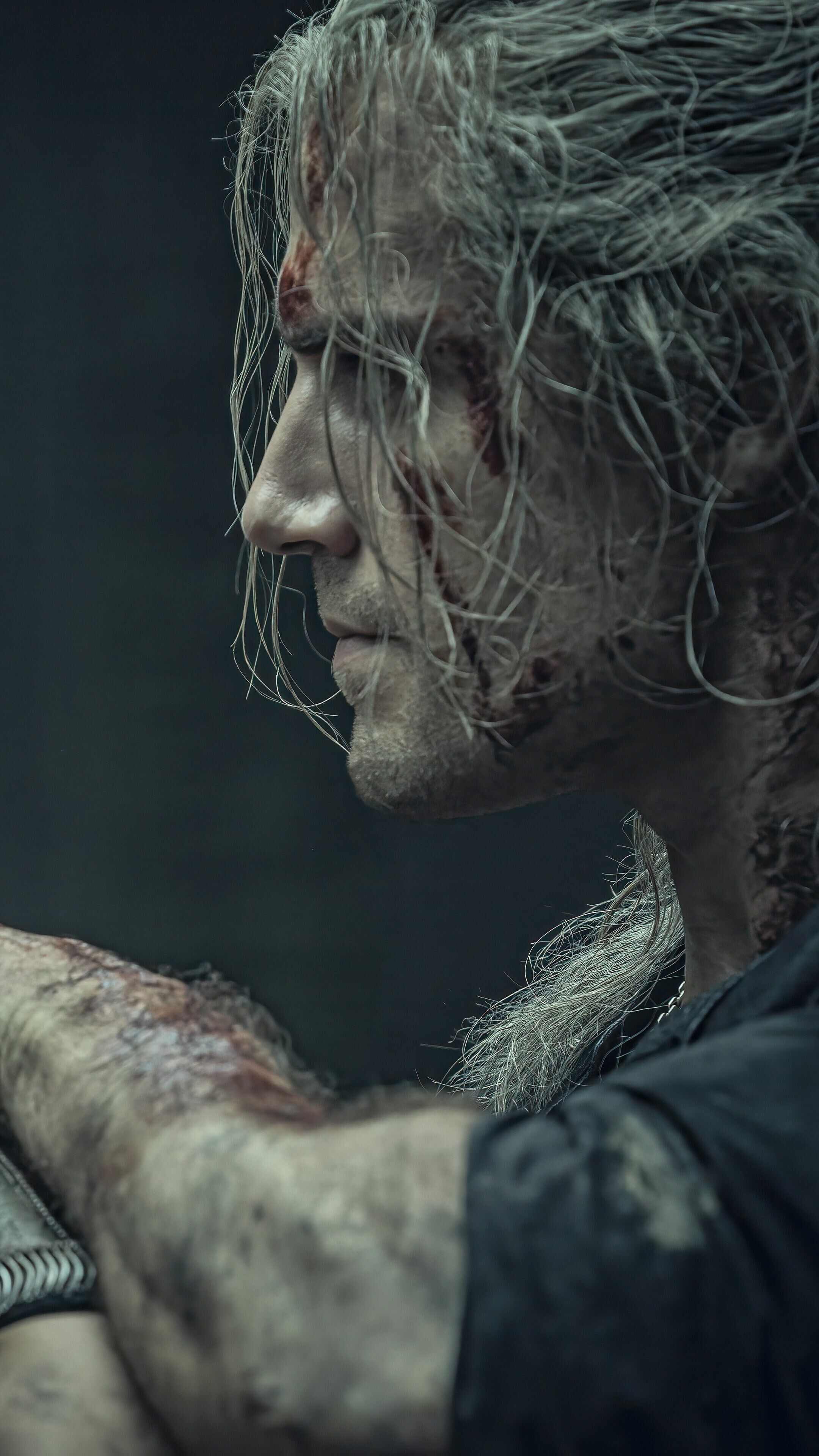 The Witcher Season 2: Henry Cavill as Geralt of Rivia, a magically enhanced monster hunter. 2160x3840 4K Background.