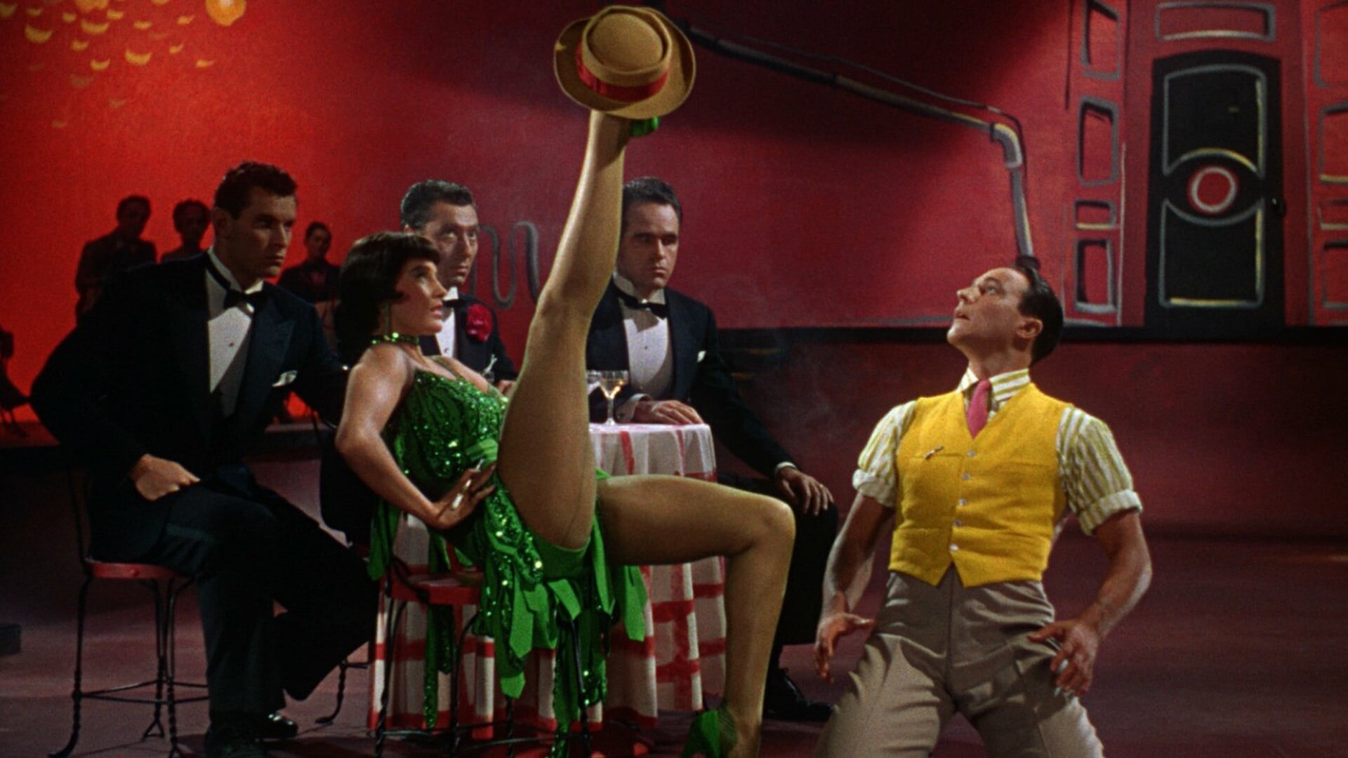 Singin' in the Rain: Cyd Charisse as the woman in the green dress who vamps Gene Kelly in the "Broadway Melody" sequence. 1920x1080 Full HD Wallpaper.