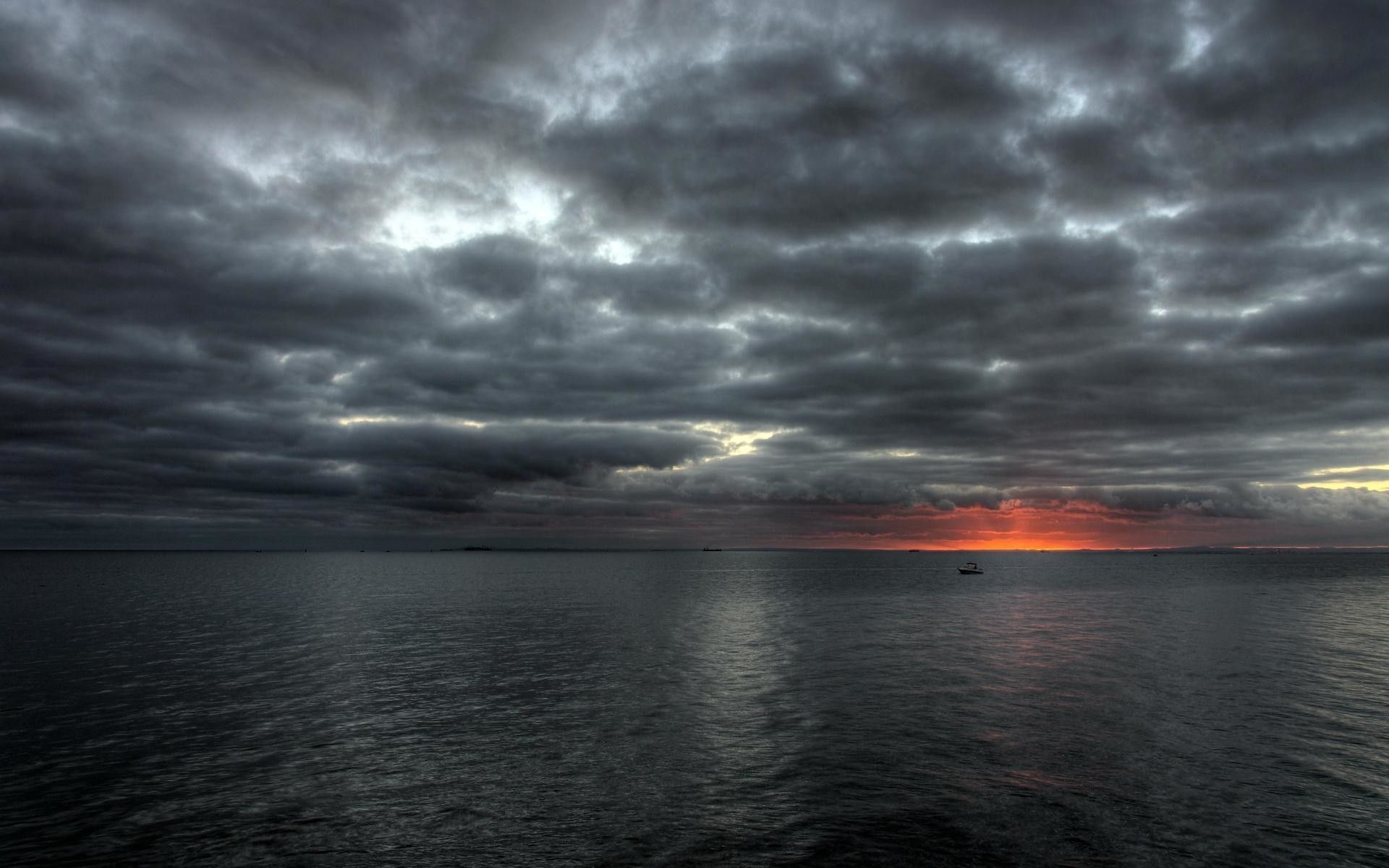 Gray Cloudy Sky: The tranquil expanse of water, Sunset, Cumulonimbus clouds. 1920x1200 HD Wallpaper.