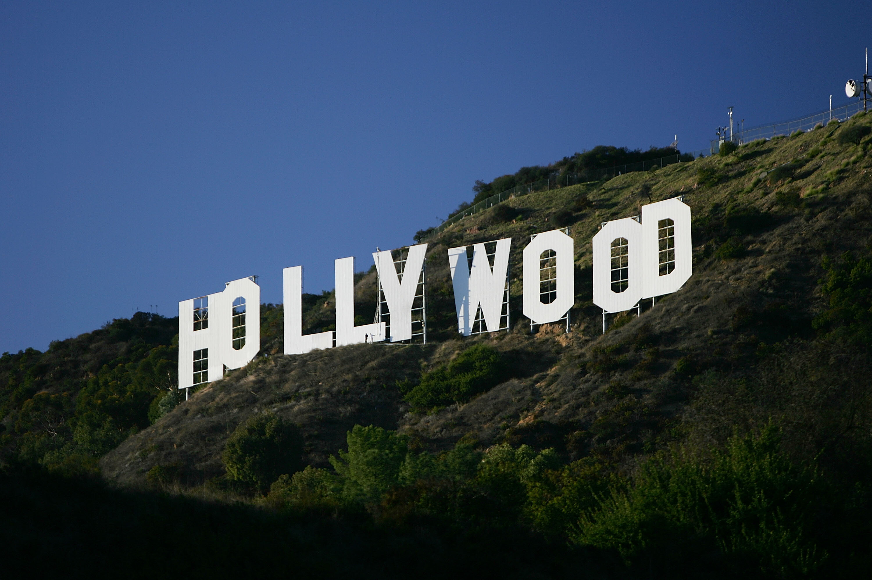 Hollywood Sign: 350 feet long, 45-foot-tall white uppercase letters in Los Angeles. 3000x2000 HD Background.