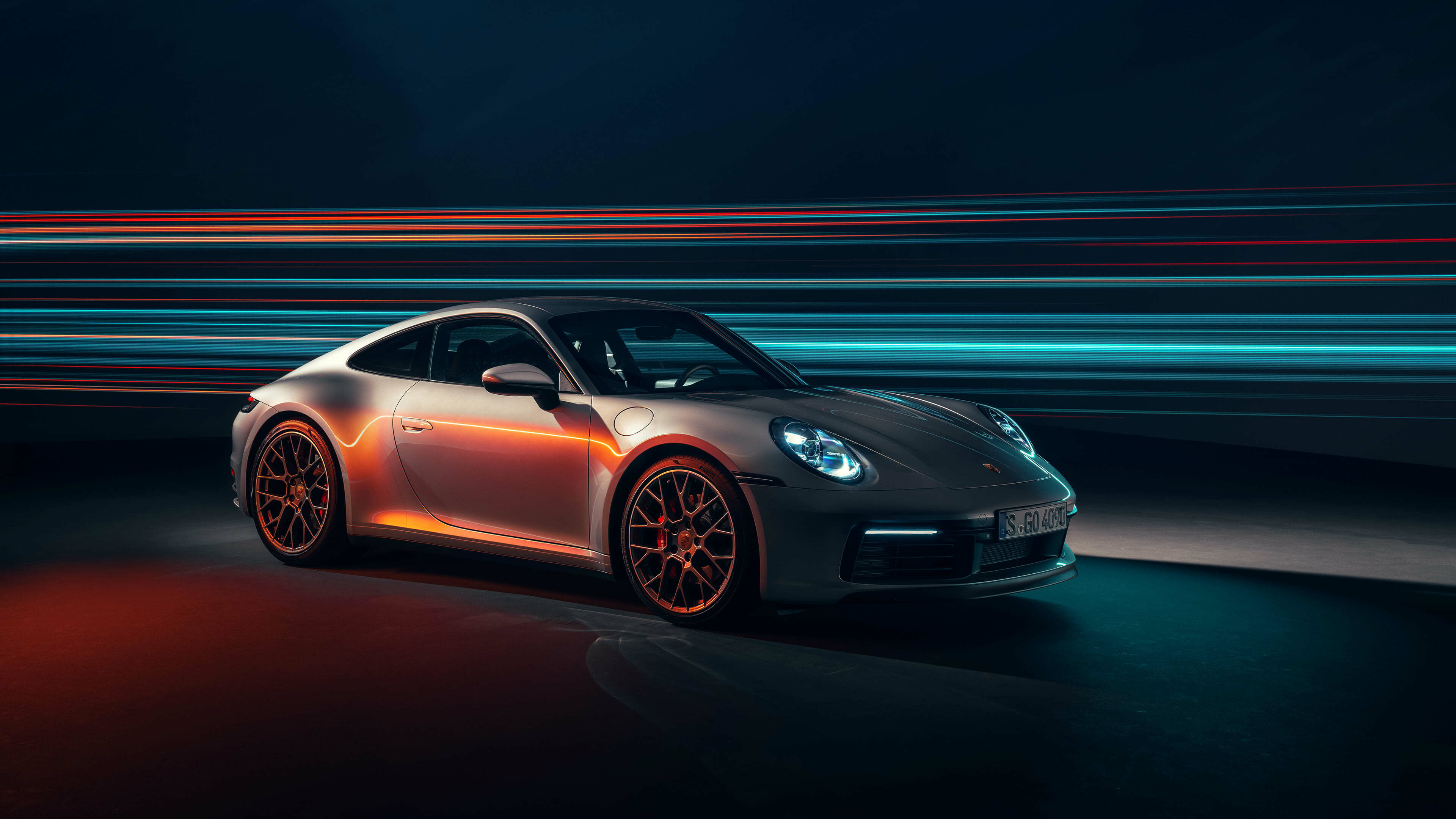Porsche: The shape of the 911 Carrera is unmistakable because of its iconic fly line and elegant roof lines. 3840x2160 4K Wallpaper.