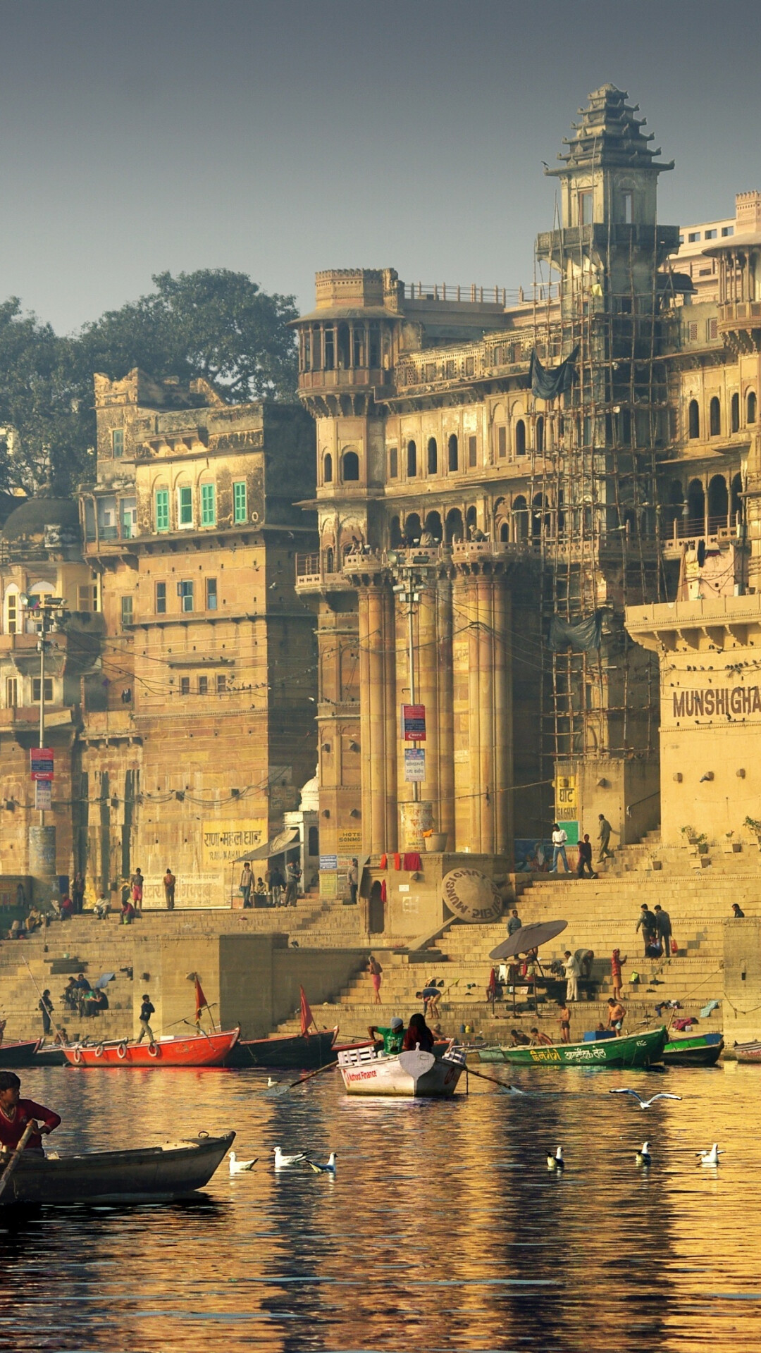 India: Munshi Ghat, Varanasi, Ganges river. 1080x1920 Full HD Wallpaper.
