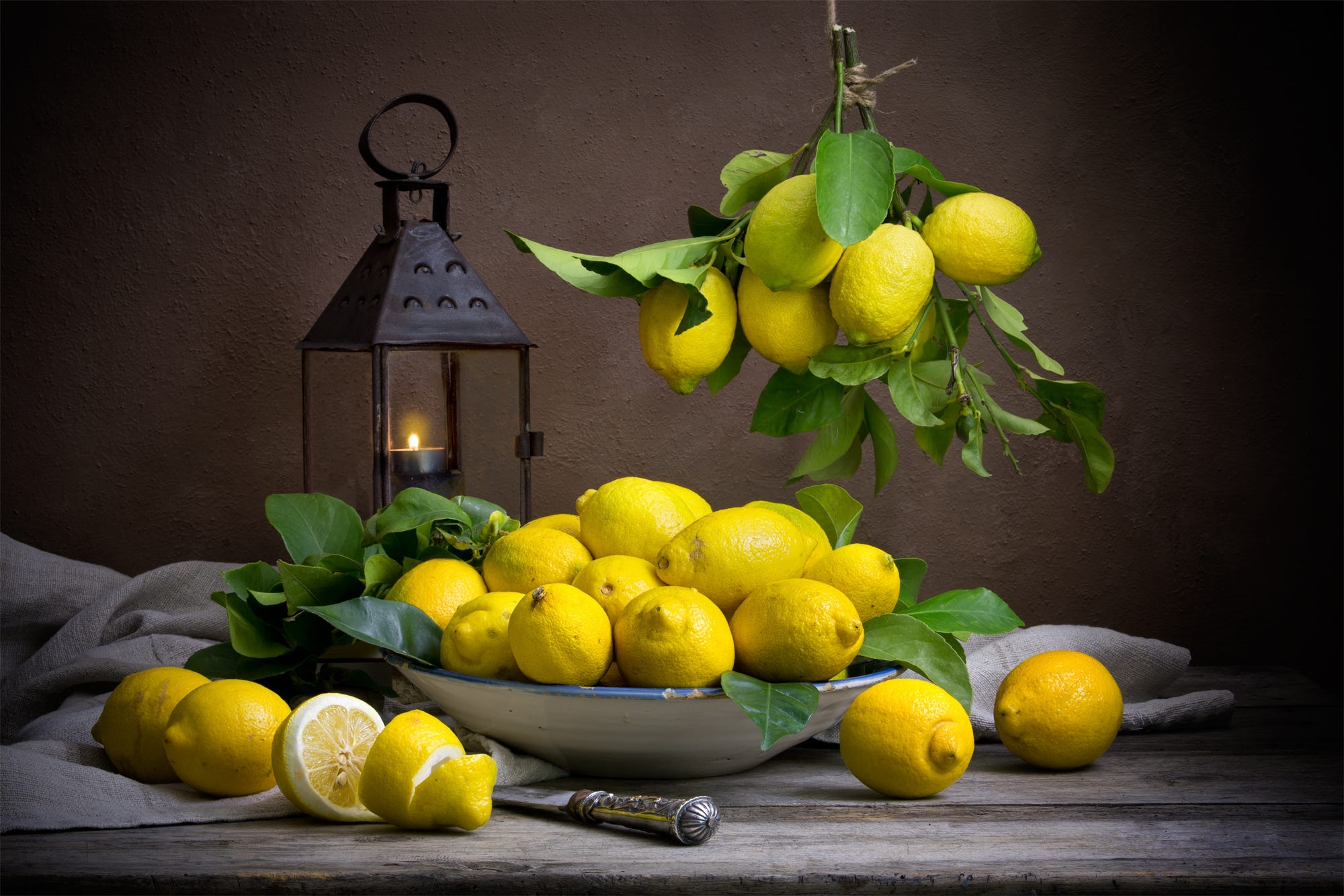 Lemon: Botanically, a many-seeded pale yellow oblong berry. 2000x1340 HD Background.