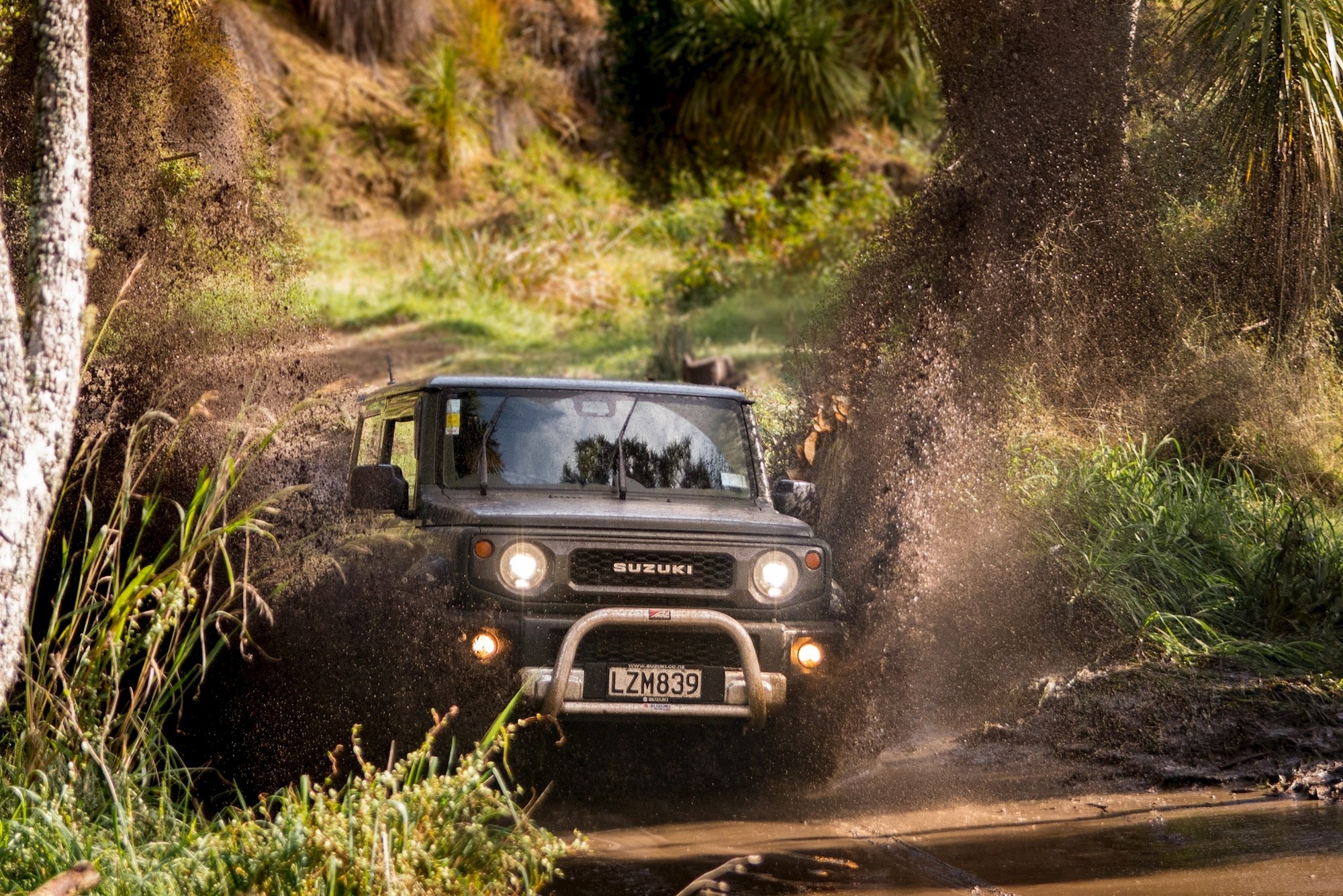 Off-road Driving: Suzuki Jimny, Driving on unsurfaced roads or tracks, Travelling over difficult terrain. 2000x1340 HD Background.