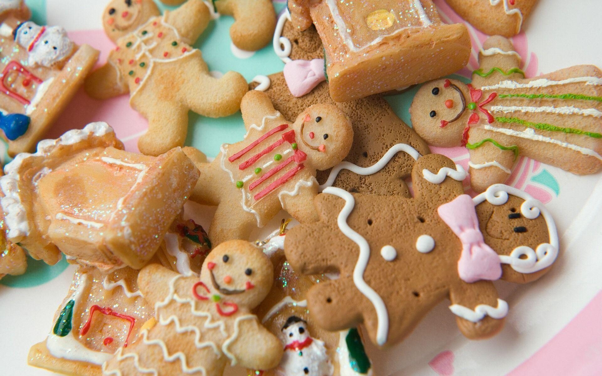 Gingerbread House: Gingerbread men, Confectionery decoration, Icing, Baked goods, Gingersnap cookies. 1920x1200 HD Background.