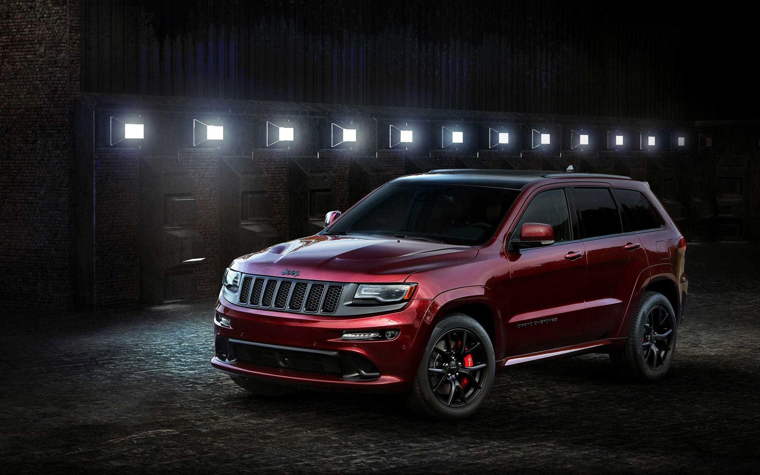 Jeep Grand Cherokee: A range of mid-size SUVs produced by the American manufacturer. 2560x1600 HD Background.