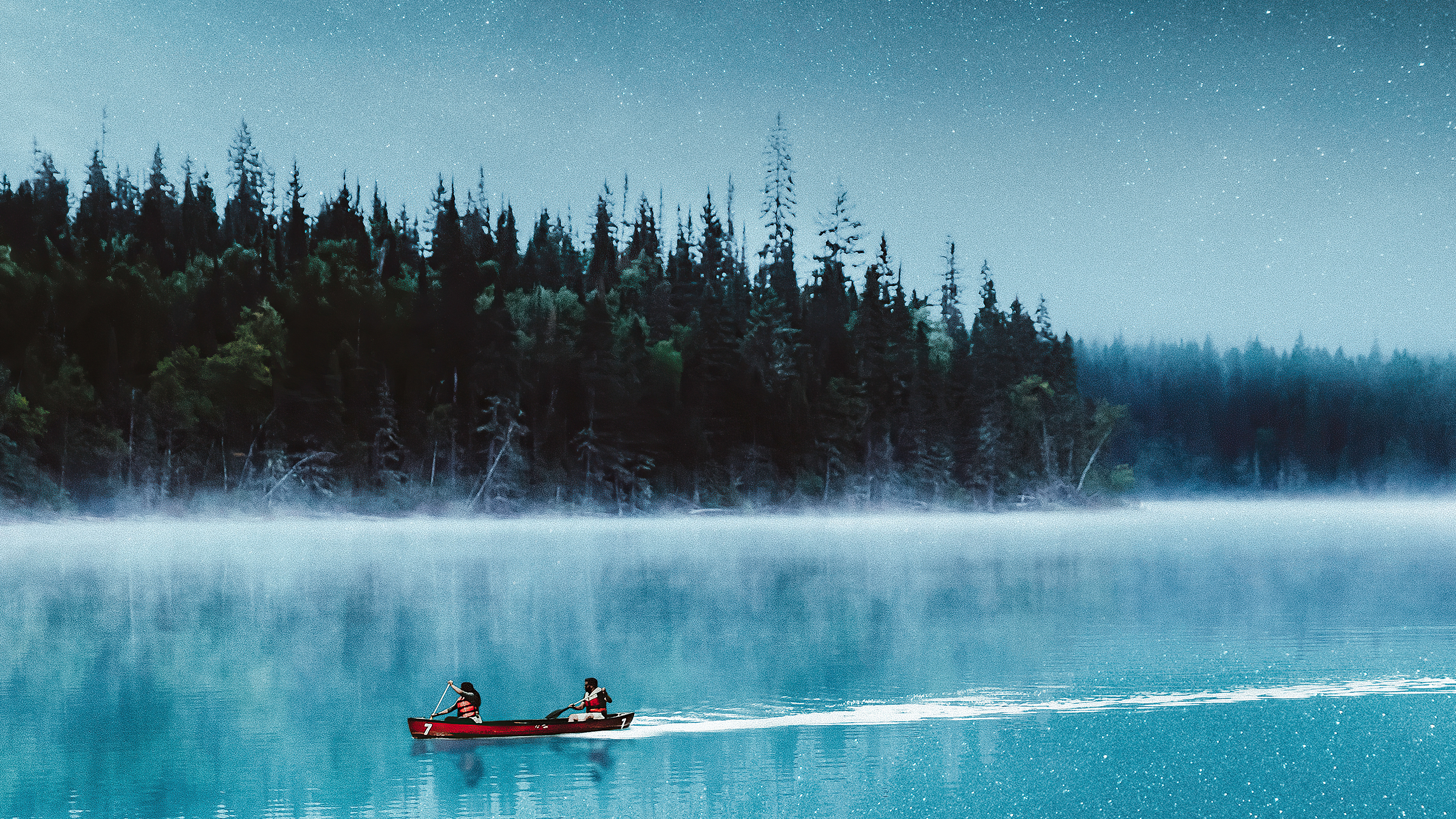 Canoeing: An activity that involves paddling a canoe with a single-bladed paddle. 3840x2160 4K Background.