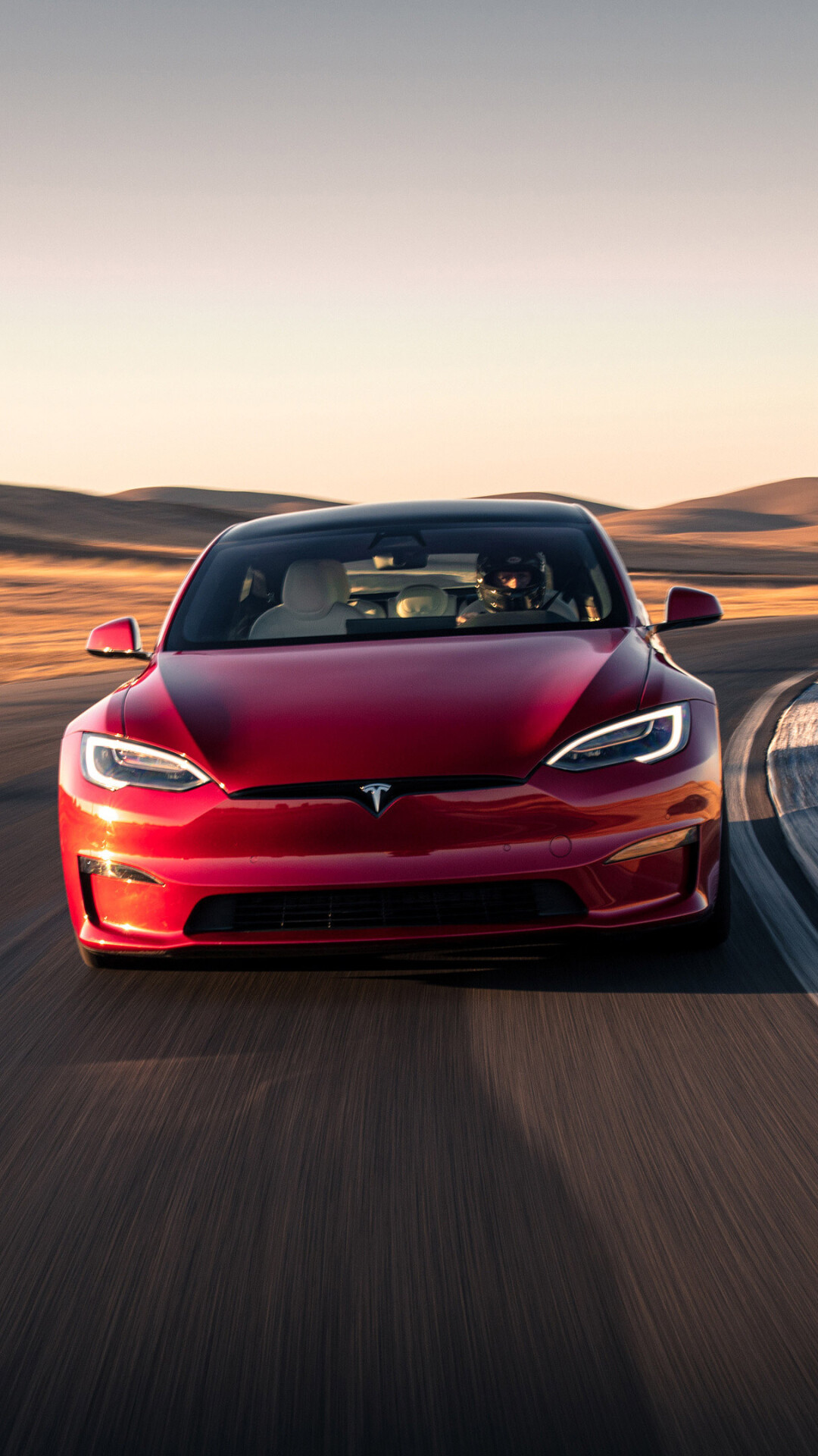 Tesla: It launched with a roadster, followed by the Model S hatchback and Model X SUV. 1080x1920 Full HD Background.