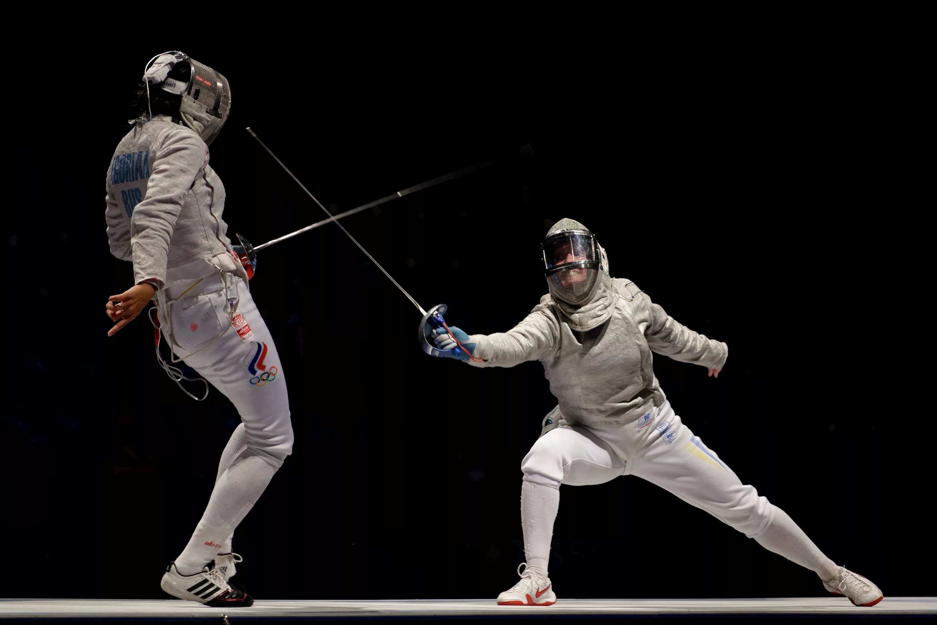 Fencing: Offensive and defensive techniques performed by Olympic athletes during a duel. 3000x2010 HD Wallpaper.