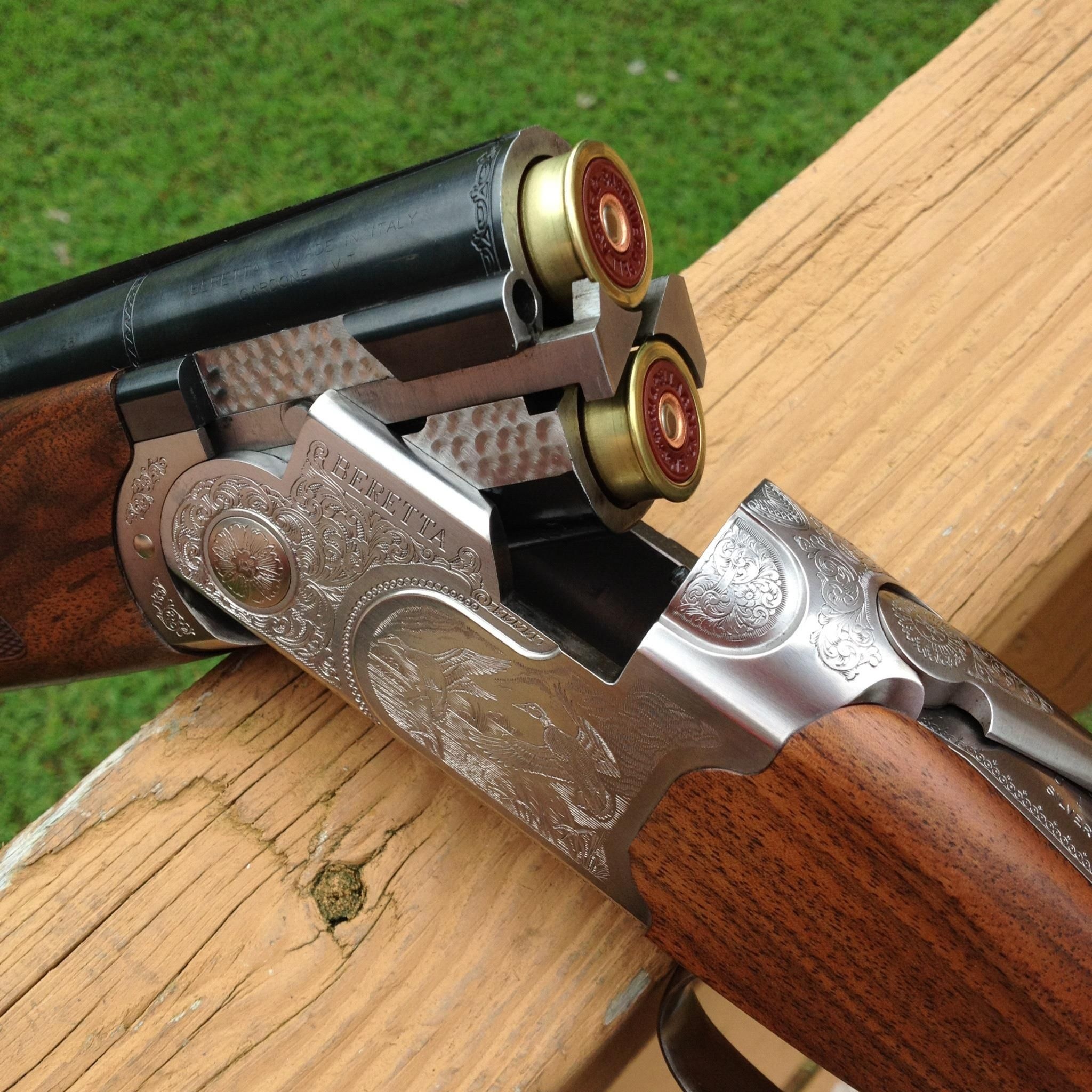 Skeet Shooting: A custom-made over-and-under double-barreled loaded 12-gauge shotgun. 2050x2050 HD Wallpaper.