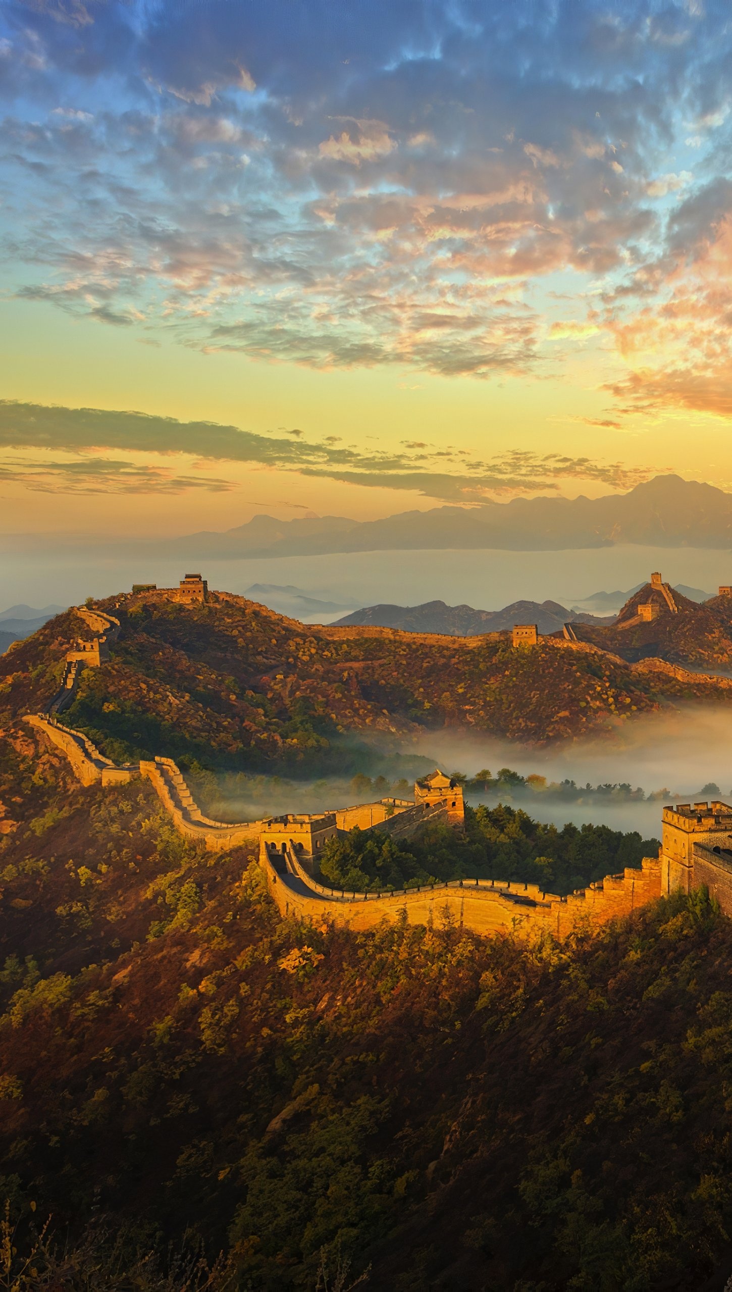 Great Wall of China: Construction began in the 7th century BC and continued until the 17th century AD. 1450x2560 HD Background.