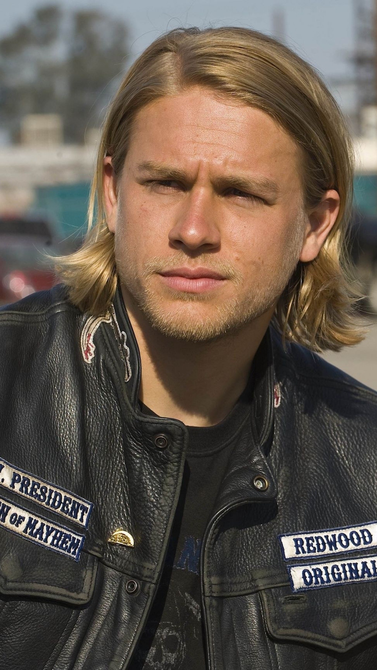 Charlie Hunnam: An English actor and screenwriter, Popular for his character on the FX series “Sons of Anarchy”. 1250x2210 HD Background.