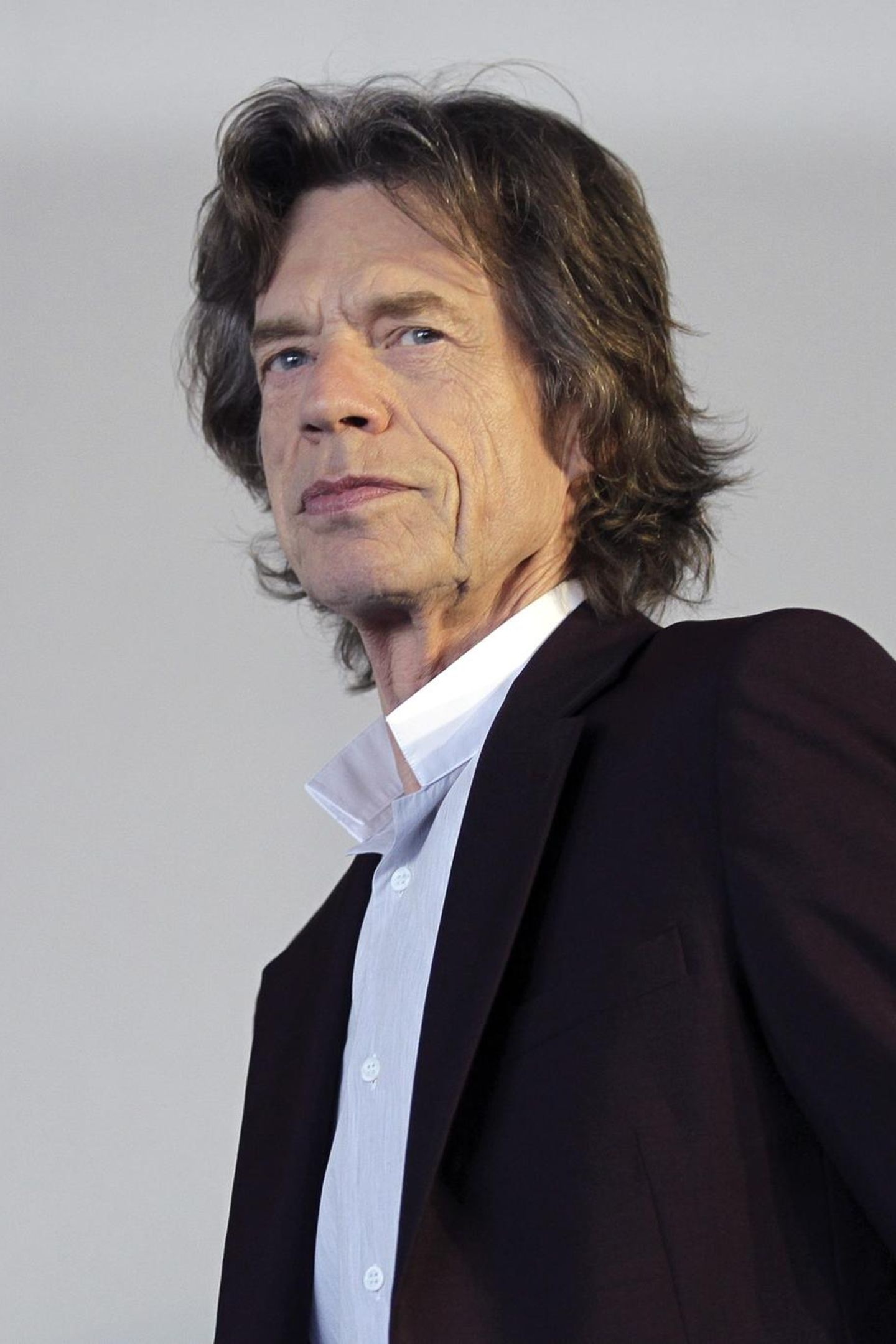 Mick Jagger, Tribute to late partner, Love and loss, Musician's journey, 1440x2160 HD Phone