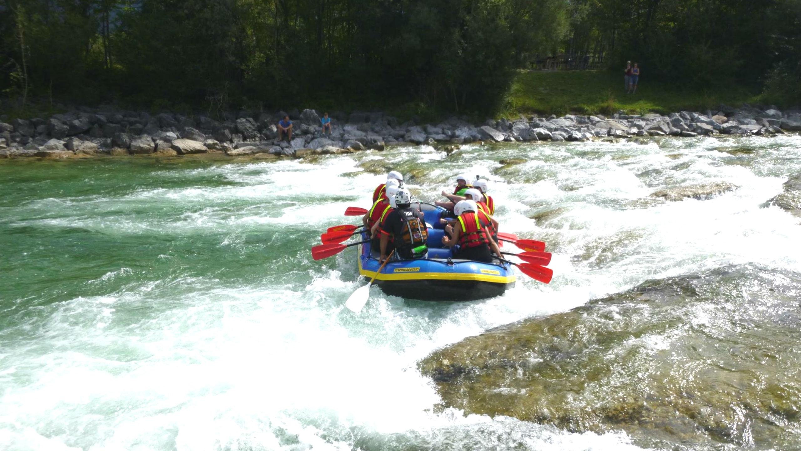 Rafting: Adventurous boating on the Isar River in Lenggries, Recreational water sport. 2560x1440 HD Background.